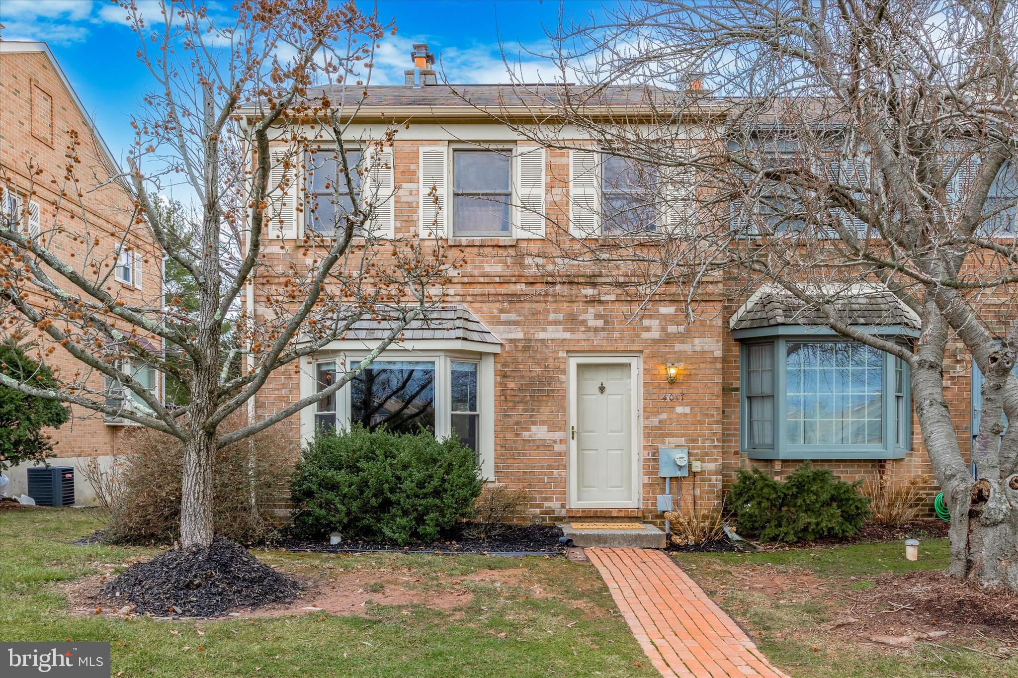 Welcome to 4017 Carriage Drive, a beautiful brick end unit townhome in the highly sought-after Carriage Run community, nestled within the award-winning Perkiomen Valley School District. 
This inviting open-concept home, featuring 3 bedrooms and 2.5 baths, promises an extraordinary living experience.
Upon entry, you will notice the spacious open concept floor plan with gleaming pergo laminated hardwood floors that flow through the entire first floor and the abundant natural light streaming in through the large floor to ceiling windows.
The spacious living room welcomes you with a charming double-sided brick, wood-burning fireplace a great space for family and entertaining.
The kitchen, the heart of the home, boasts new appliances, ample counter space, and an island that serves as the perfect prep space and breakfast bar while the well-appointed dining area, adorned with a bay window stands ready to host family and friends.
On this level, included is the powder room and sliders leading to the deck—an ideal spot for enjoying morning coffee or hosting gatherings. The spacious deck, complete with stairs to the open green space, adds an extra touch of outdoor enjoyment.
Upstairs, the primary bedroom offers the convenience of a double closet and an en-suite bath. Two additional bedrooms, each with custom closets, provide space and tranquility, and the hall bath perfectly rounds out the spacious second floor.
The lower level reveals a hidden gem with ample space adaptable to various purposes, whether as an office, workout area, or playroom, and complete with an outside entrance.
Beyond the home, enjoy convenient walking trail access to the charming historic district, boutique shopping, and fine dining. Commuting is effortless with quick access to major roadways and public transportation. This residence epitomizes suburban living at its finest, offering a perfect balance of serenity and space for its fortunate new owners. 🏡😄 Come explore this home and make it yours!