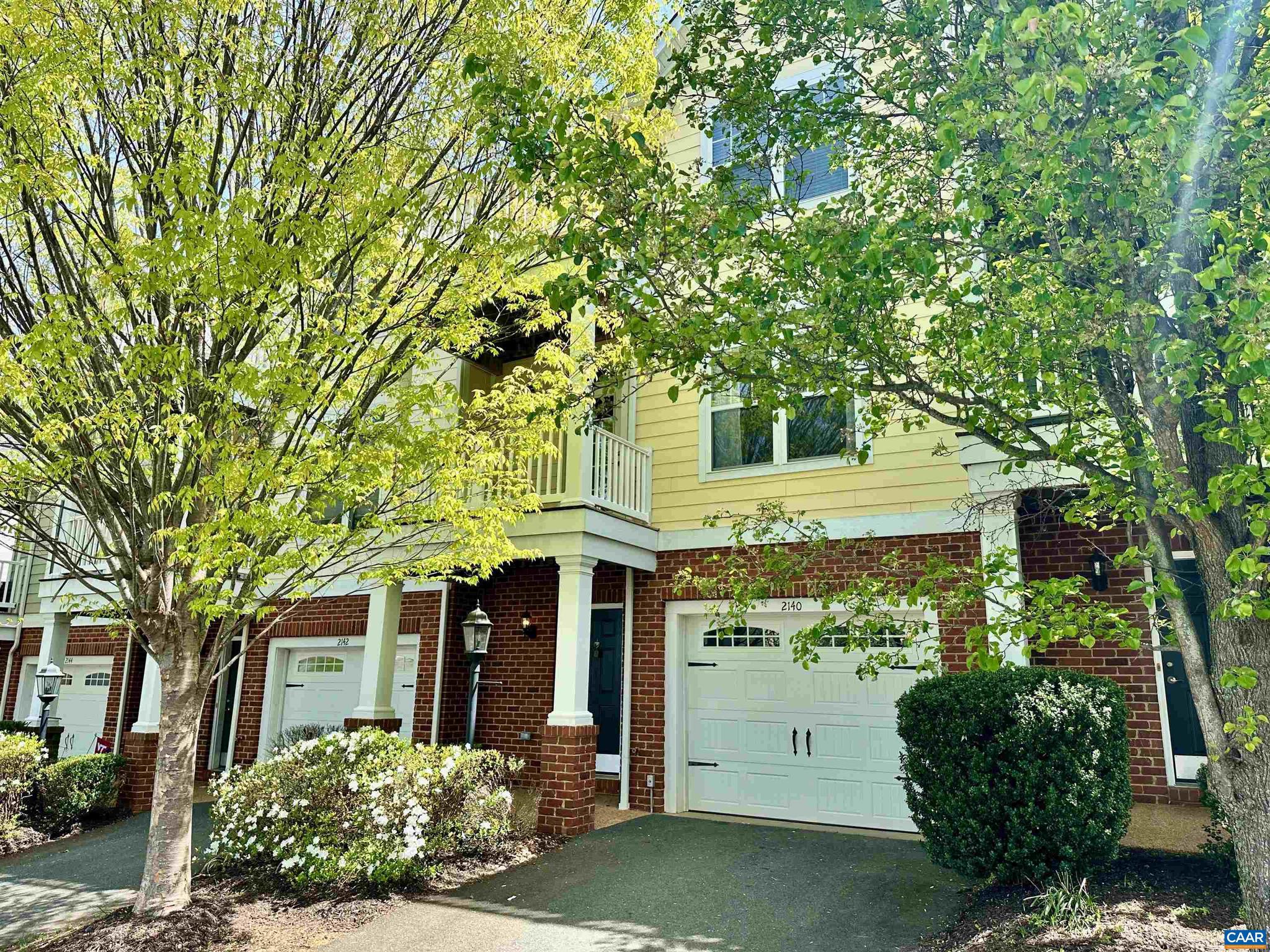 Perched in one of Charlottesville's most convenient corridors, 2140 Saranac Court offers thoughtful design, elevated views, and effortless access to everything the city has to offer.  Inside, over 2,100 square feet of light-filled living space features hardwood floors, maple cabinetry, and an updated kitchen with modern appliances that flows naturally into the main living areas ? ideal for quiet evenings or hosting guests. Three bedrooms, three full baths, and in-unit laundry complete a floor plan built for everyday comfort.  A partially finished basement adds flexibility for a home office or gym, while the attached garage keeps daily life running smoothly. Step onto one of the private balconies and take in sweeping elevated views that make morning coffee feel like a small luxury.  Pantops puts you at Charlottesville's crossroads ? minutes from shops, restaurants, and daily essentials, with I-64 and the 250 Bypass a minute from your door. Downtown and UVA are a straight shot, without the parking headaches or premium price tag of living closer in.,Granite Counter,Maple Cabinets