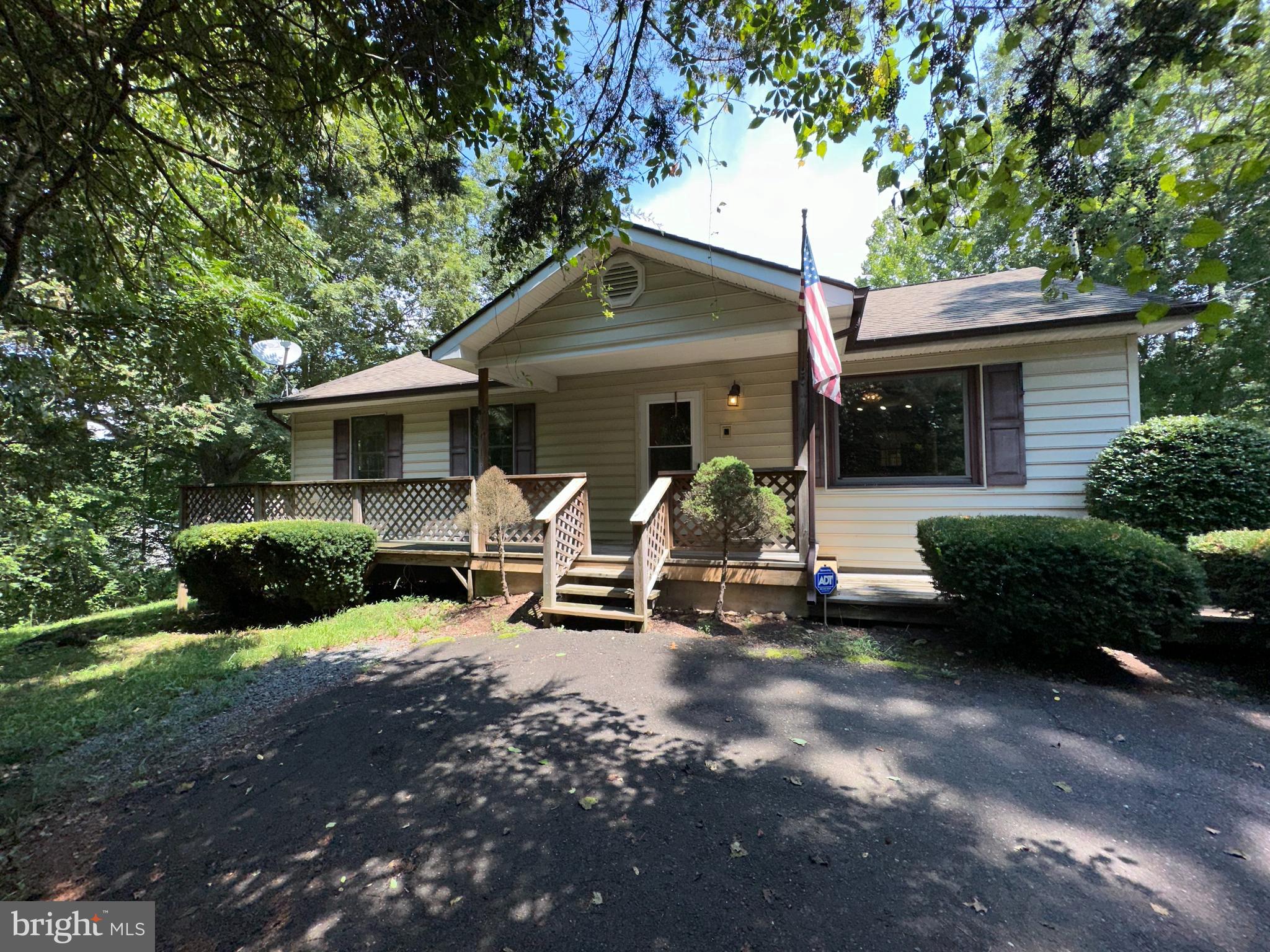 SOLD.   Amazing opportunity! OPPORTUNITY HAS STRUCK. WHERE WERE YOU.?. -----> ME ON FB. This was absolutely the best bargain in Culpeper. 2 bed, 2 bath home with an open kitchen, adjacent laundry room, living/dining combo, separate den and huge family room overlooking the gorgeous backyard!  Quaint and cozy home with plenty of storage and parking available.  1 full size acre, almost entirely flat and cleared, approx 85%,  tons of natural foliage and beauty. 
CHEAPER THAN RENT!  No HOA and low property taxes (less than 1.4k in 2023).  
CHEAPER THAN RENT!- Close to schools (E,M,H), shopping, restaurants, public parks, golf courses and mass transit. 45-60 minute drive time from Charlottesville, Manassas, Fredericksburg. Charlottesville airport is a quick and easy 45 minute drive.  Frequent flights to Atlanta (ATL), Charlotte (CLT), New York–LaGuardia (LGA), Washington D.C.–Dulles (IAD), Chicago (ORD). 
CHEAPER THAN RENT!-  Skyline Drive National Park is a one hour drive away and a sightseer's paradise! Amtrak station in downtown Culpeper, 5 min drive, with a direct line to Washington D.C.  Perfect for day trips, commuting, or taking a railway vacation of your dreams. - Culpeper is the best little town in the Virginia piedmont.  CALL TODAY!  CHEAPER THAN RENT! FHa LOaN SOLDD.