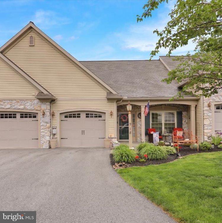 Welcome home to this stylish, warm, and inviting ranch-style townhome in the vibrant 55+ community of Briar Lake! A beautifully landscaped entrance and welcoming front porch greet you upon arrival. Inside, the seamless open layout features an updated kitchen with classic white cabinetry, Corian countertops, a tile backsplash, a center island, pendant lighting, and stainless-steel appliances. The dining and living areas boast newer wide-plank luxury vinyl flooring; perfect for entertaining. Six added solar tubes flood the home with natural light. Relax in the stunning sunroom overlooking a picturesque patio and garden area.
The spacious primary suite features a private bath with a double-bowl vanity and a walk-in closet. Off the foyer, you'll find a second bedroom, a full hall bath, and a laundry room. No basement? No problem! The walk-up attic has been thoughtfully refinished into a 200 SF family/flex room, bringing the total living space to over 1,600 SF, alongside a massive storage area with shelving units. Complete with economical gas heat and a 1-car garage, this updated home offers effortless first-floor living.  Briar Lake offers a scenic lakeside setting with walking trails, a community clubhouse, a lakeview deck, fishing & boating access, and year-round social activities. The $175/month HOA fee covers trash, common area maintenance, and clubhouse privileges. Conveniently located near Lititz, Lancaster, Hershey, Harrisburg, and Reading with easy access to major routes, shopping, and dining. Schedule your showing today!