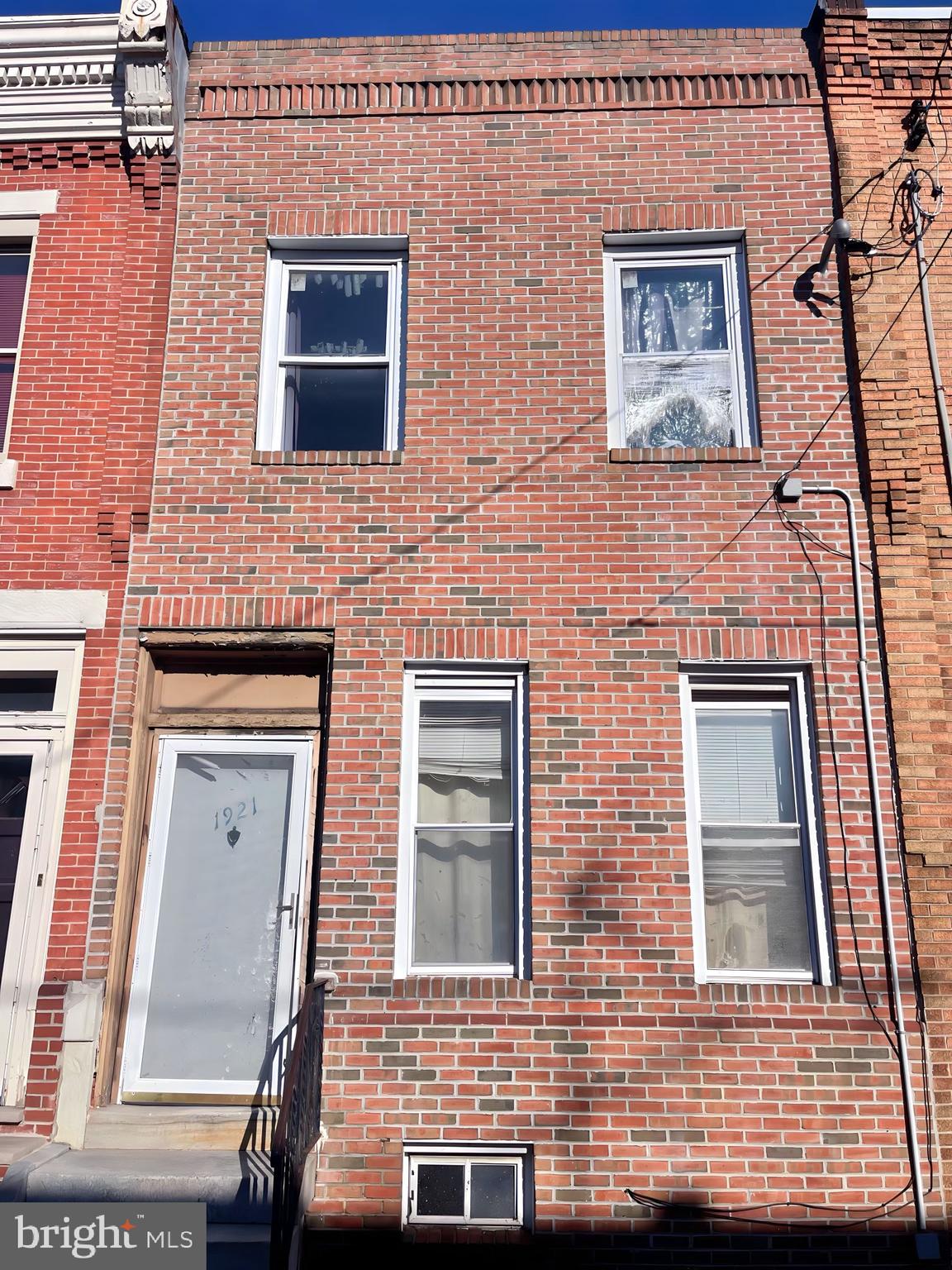 Attention Investors! Don't miss out on this fantastic opportunity! This spacious 4-bedroom, 1 1/2 bath home is situated on a wide street, boasting a newer brick front and nestled in a burgeoning area. Upon entering, you'll be greeted by an open floor plan, complete with a separate laundry area and a convenient partial bath with rear access to a sizable concrete yard.

The second floor features four generously sized bedrooms and a full bath, providing ample space for a comfortable living arrangement. The basement, though currently unfinished, offers great potential with its concrete flooring and updated electric, boiler, and hot water heater.

While the property is in habitable condition, it's worth noting that some updates are needed. The attractive pricing reflects this, making it an ideal opportunity for those looking to invest in a property with excellent potential. Take advantage of the chance to add value through renovations and updates, capitalizing on the property's promising location.