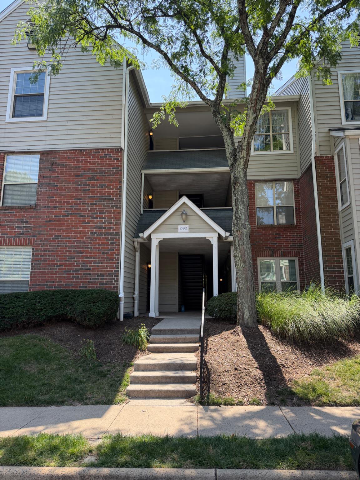 Your Chance to grab this beautiful 2 bedroom condo in sought after Penderbrook Square. This well maintained first-floor residence offers 876 square feet of open living space with a  private patio. Spacious living room boasts a wood-burning fireplace and a built-in book shelve, open to the kitchen with Maple cabinets and breakfast bar. Large utility room with extra shelfing/ storage. Primary bedroom with tray ceiling, a ceiling fan and oversized walk-in closet. Light filled second bedroom offers ample closet space and direct access to the private patio, perfect for morning coffee or early evening relaxation. The large bathroom includes dual entry points and an in-unit washer and dryer for your added convenience. There is one assigned parking space as well as plenty of visitor parking. Floor replaced last summer. Newer water heater. Residents enjoy access to the Penderbrook Square Clubhouse which features outdoor swimming pool,  fitness room, community room, mail room, barbecue area and tot lots. Residents also have the Penderbrook Community amenities that include state-of-the-art fitness center and pool; basketball, pickle ball, and tennis courts, scenic walking paths, and discounted green fees at the golf course. With easy access to shopping, dining, Costco, Fair Oaks Mall, route 55, I-66, and public transportation, A MUST SEE!