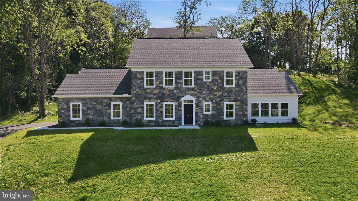Book your private tour today or take the online 3D tour now! Located in the South Guilford Hills area, this newly constructed Colonial-style home at 130 Woodbriar Drive offers an unparalleled blend of luxury, modern convenience, and architectural elegance. Set on the cul-de-sac of Woodbriar Estates subdivision, you're going to immediately love the neighborhood, which has NO HOA.

Built in 2025, the residence stands as a testament to quality craftsmanship, featuring an exterior finished with authentic Pennsylvania stone and Hardie Board, complemented by high-end Pella double-pane tilt-in windows and a professional GAF architectural asphalt shingle roof. 

As you step through the front door, you are greeted by a grand two-story foyer featuring a stained oak staircase that sets a sophisticated tone for the rest of the 3,004-square-foot home. The main level is designed with 9-foot ceilings and 20-mill Daltile plank LVF flooring, creating an airy and seamless flow throughout the living spaces. The heart of the home is a modern kitchen equipped with stunning granite countertops, a functional pantry closet, and premium plywood cabinets featuring slow-close hinges and drawers. This culinary space opens to a high-ceiling living room flooded with natural light, perfect for both daily relaxation and upscale entertaining.  

Designed for long-term comfort, the first floor hosts a primary suite that serves as a private sanctuary, complete with a freestanding tub in the primary bath. Flexibility is a hallmark of this property, which offers between four and five bedrooms and four full bathrooms. A dedicated space on the main level can serve as either a home office or a fifth bedroom, highlighted by a Tiffany-style ceiling light. 

The second floor includes an upstairs flex room, additional bedrooms with 24-ounce TrafficMaster carpet, and the convenience of dual laundry facilities with hookups on both the first and second floors. Practicality meets performance with a Trane 14 SEER HVAC system, a 55-gallon electric water heater, and a 200-AMP electrical service. The property also includes an extra-deep two-car garage with an 8-foot door and a back porch featuring an elegant exterior stained ceiling. Situated on a 0.41-acre lot on a quiet cul-de-sac street with underground utilities and public water and sewer, this home offers a low-traffic neighborhood environment without sacrificing modern essentials. This stunning new construction represents a rare opportunity to own a  masterfully built home in Chambersburg, just minutes from everything the Route 30 corridor has to offer, including access to I-81.  Please note, some photos have been virtually staged, as shown on the listing photos.