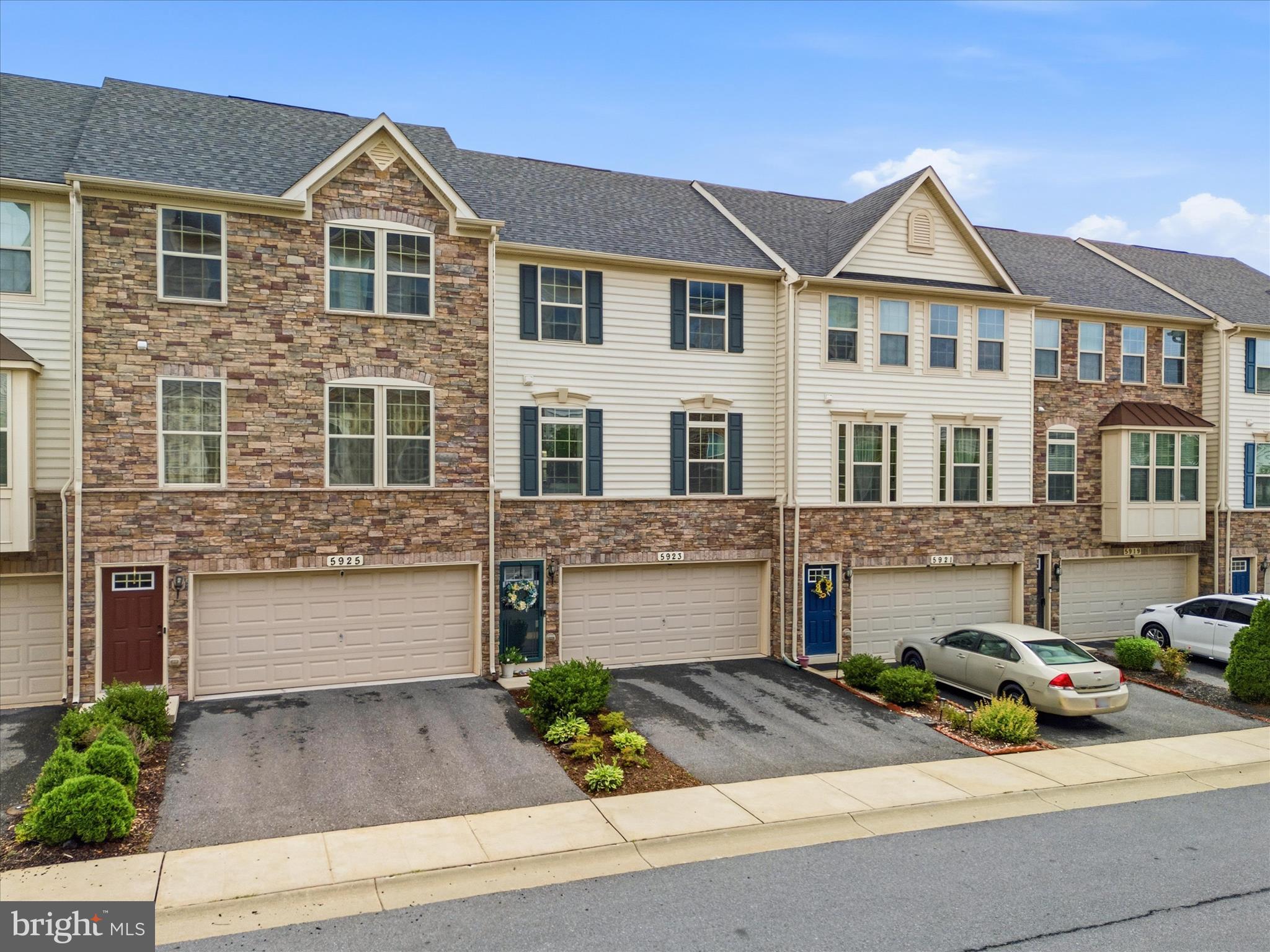 Looking for space, convenience, and a community you’ll love coming home to? Welcome to 5923 Leben Drive in Jefferson Place, where one of the neighborhood’s largest floorplans offers approximately 2,432 square feet of light-filled living space, a sought-after two-car garage, and a finished walk-out lower level. Updated LVP flooring throughout the main level adds both style and durability, creating a warm and welcoming first impression.

From the moment you enter, you’ll appreciate the abundance of natural light and the spacious, open layout. The heart of the home is the expansive kitchen and dining area, enhanced by a desirable bump-out that creates the perfect setting for everything from casual family dinners to holiday gatherings with friends. A favorite feature of the current owners, this oversized kitchen has been the backdrop for countless gatherings, celebrations, and everyday moments over the years. The adjoining family room offers plenty of space to relax, entertain, or simply enjoy a quiet evening at home. A conveniently located half bath completes the main level.

Upstairs, the thoughtfully designed bedroom level features three spacious bedrooms, two full baths, and a true laundry room—not a hallway closet, but a dedicated space that makes everyday living easier and more organized. The primary suite offers a peaceful retreat with a tray ceiling, spacious walk-in closet, and a private bath featuring both a relaxing soaking tub and separate walk-in shower, creating a spa-like escape where you can begin and end each day in comfort.

The finished walk-out lower level provides exceptional flexibility with a media room, full bath, and additional living space perfect for movie nights, game days, a home office, workout area, or guest suite.

Step outside to enjoy the fenced backyard complete with a low-maintenance Trex deck and spacious patio—another favorite feature of the current owners. Whether hosting summer barbecues, gathering with friends and family, or simply enjoying a quiet evening outdoors, these outdoor living spaces were designed to be enjoyed.

Jefferson Place offers more than just a home—it’s a lifestyle. Residents enjoy access to exceptional amenities, including a clubhouse, fitness center, swimming pool, playgrounds, walking trails, sports courts, and community green spaces.

Ideally located just off Route 340, you’ll enjoy easy access to Interstates 270, 70, and 15, multiple MARC train stations, downtown Frederick, shopping, dining, and everyday conveniences. Best of all, you’ll enjoy all of these conveniences with the added benefit of no city taxes. Combining generous living spaces, abundant natural light, exceptional amenities, and a prime commuter-friendly location, 5923 Leben Drive is ready to welcome you home.