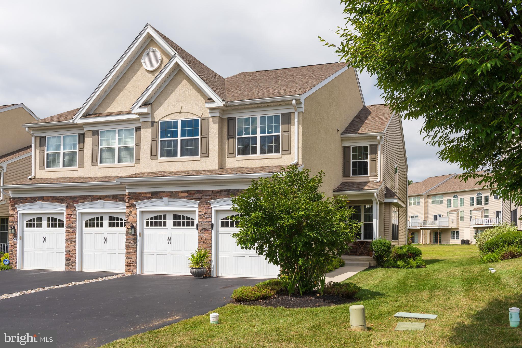 Stunning carriage Home in Downingtown School District – Northeast Facing, Premier Location!

The home showcases 9-ft ceilings on both the main level and basement, gleaming hardwood floors, fresh designer paint, and recessed lighting throughout the first floor. The welcoming foyer opens to a formal living room and gracious dining room with chair and picture frame molding.

At the heart of the home, a sun-filled two-story family room features a marble-surround gas fireplace and oversized windows that fill the space with natural light. The gourmet kitchen boasts rich wood cabinetry, granite countertops, tile backsplash, stainless steel appliances, gas cooktop, double wall ovens, and a pantry. The adjoining breakfast area opens to a maintenance-free deck, perfect for outdoor dining and relaxation with serene backyard views.

Upstairs, the expansive primary suite offers a tray ceiling, two walk-in closets, recessed lighting, and a spa-inspired bath with dual vanities, soaking tub, and upgraded tile finishes. Two additional bedrooms, a full hall bath, and a convenient laundry room complete the second floor.

A large unfinished basement with 9-ft ceilings provides excellent storage or future finishing options. Additional features include a two-car garage, economical gas heating, and a low-maintenance exterior.

Enjoy resort-style living with two clubhouses, two outdoor pools, fitness centers, saunas, sports courts, playgrounds, and scenic walking and biking trails. The community also hosts vibrant social events including outdoor movies, holiday celebrations, and seasonal festivals.

Located in the award-winning Downingtown East School District, home to the top-ranked STEM Academy, this home offers easy access to major routes including the PA Turnpike, Routes 100 & 202, and is minutes from the Exton Train Station for effortless commuting. Conveniently situated near Malvern, Paoli, King of Prussia, Downingtown, Exton, Pottstown, and Royersford, with easy travel to Philadelphia and the airport, this home truly combines luxury living with unmatched convenience.

Don’t miss this exceptional opportunity to own a stunning home in The Courts at Byers Station—schedule your private showing today!