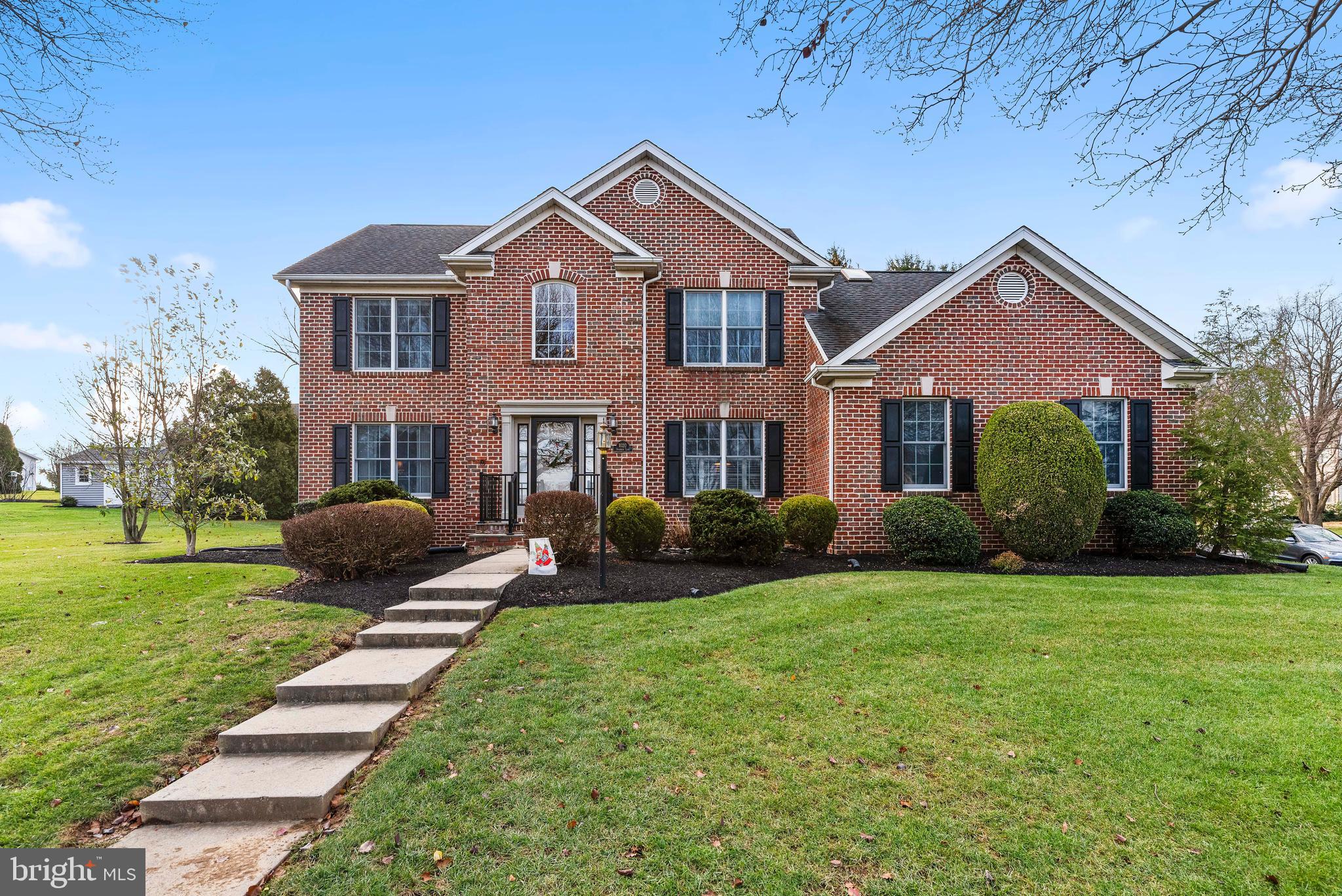 Pride of ownership is evident throughout this immaculately kept, 3,000+ square foot home.  The lovely updated kitchen has quartz countertops, recessed lighting and top of the line stainless steel appliances.  This is open to a breakfast nook and cozy family room with gas fireplace.  The first level also has formal living and dining rooms as well as a separate den/office with built-in bookshelves - perfect for an in-home occupation! A grand 2-story foyer boasts the authentic and upgraded hardwood floors which have been added to the entire house. Upstairs, you will find a primary suite with huge walk-in closet and garden tub as well as three additional bedrooms.  The partially finished lower level offers extra space with family room and fireplace.  Spend weekends entertaining and relaxing on the rear patio that has trex decking, pavers and a pergola.  Mechanicals are all in excellent condition and the HVAC is serviced yearly.  Lots of love has been given to this home over the years as this sprawling two story awaits it's new owner.