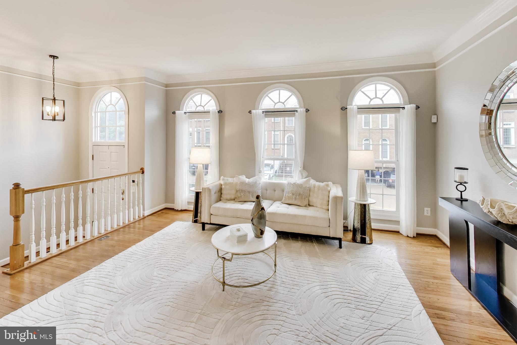 Welcome home to this stunning luxury townhome quietly nestled in highly sought-after Vienna, just moments from the world-class dining, upscale shopping, and vibrant energy of Tysons. Meticulously maintained and entirely move-in ready, this impeccable residence has been freshly painted throughout in a crisp, designer-neutral palette. Brand-new contemporary lighting fixtures have been thoughtfully installed across the home, adding an undeniable touch of sophisticated elegance to every room.

Step inside to discover a bright, expansive open-concept floor plan designed for both everyday living and effortless entertaining. The brilliant new lighting beautifully highlights the home's premium finishes and gorgeous hardwood flooring. At the heart of the home, the gourmet kitchen features  stainless steel appliances, premium granite countertops, and a generous central island , flowing seamlessly into the spacious family room living and dining areas.

Upstairs, the luxurious primary suite serves as a private oasis complete with [insert primary bath details, e.g., a spa-like en-suite bath and dual walk-in closets]. The secondary bedrooms are generously sized and flooded with natural light. Downstairs, the versatile lower level offers the perfect space for a home office, media room, or guest suite, complete with direct access to the 2-car garage.

Step outside to enjoy your private outdoor space perfect for morning coffee or evening cocktails.

Location is everything: enjoy incredibly easy access to Tysons Galleria, the Silver Line Metro, and major commuter arteries (I-495, Route 7, I-66), offering a seamless commute to Washington D.C., all while maintaining the neighborhood charm and excellent schools of Vienna.

Fresh, modern, and perfectly located—this exquisite townhome is ready for its next chapter. Schedule your tour today!