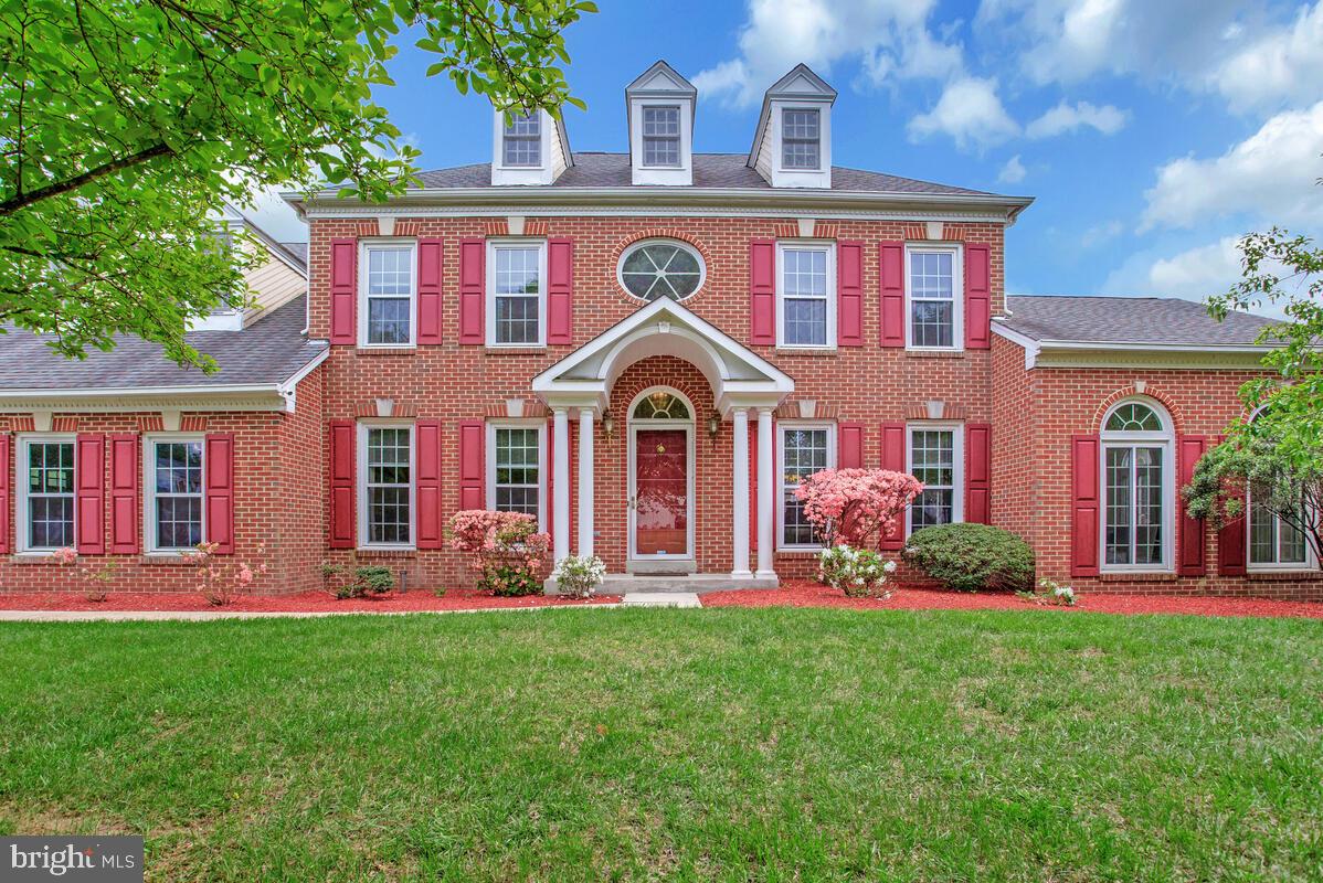 Experience the grandeur of this Stately and Elegant Colonial situated on a quiet corner lot in Bowie's desirable Collington Station Neighborhood. Upon entering the main level, you are welcomed by stunning hardwood floors and upscale chair and crown molding, leading to a spacious family room complete with a cozy wood-burning fireplace, perfect for chilly evenings indoors. The gourmet kitchen, filled with natural light from the expansive bay window, boasts stainless steel appliances, including a gas range, ample cabinetry, a pantry for storage, and a built-in writing desk. The upper level features a magnificent primary suite with soaring vaulted ceilings, two walk-in closets, and a generous ensuite bathroom equipped with a dual vanity, skylights, a tub, and a glass-enclosed shower. The oversized unfinished basement awaits your personal touch and already includes a rough-in for a full bath. Conveniently located just minutes from shopping, restaurants, entertainment, and major highways, this home is a commuter's dream. Don’t miss out on this exceptional opportunity—act quickly, as this one won’t last long!