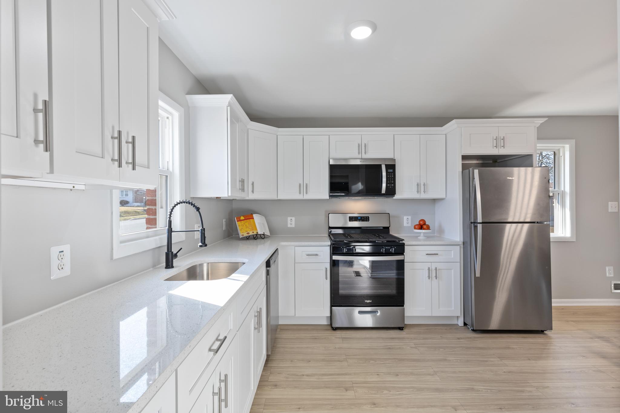 5.5% 30 year fixed rate available from a local bank - inquire to learn more! 
Welcome to 7418 Remoor Rd, a beautifully renovated 3-bedroom, 2 bathroom single-family home in Baltimore, MD. This home  seamlessly blends modern amenities with classic charm. The spacious open-concept living area boasts recent updates, including new windows, luxury vinyl plank flooring, and a gourmet kitchen with stainless steel appliances and quartz countertops—perfect for entertaining. Enjoy the convenience of a finished basement, offering additional space ideal for a home office, gym, or recreation room. Step outside to the expansive backyard, a private oasis perfect for outdoor gatherings or quiet relaxation. Nestled in a peaceful neighborhood with easy access to shopping, dining, and major highways, this home offers the ideal balance of suburban tranquility and urban convenience. Don’t miss your chance to make this stunning property your own!