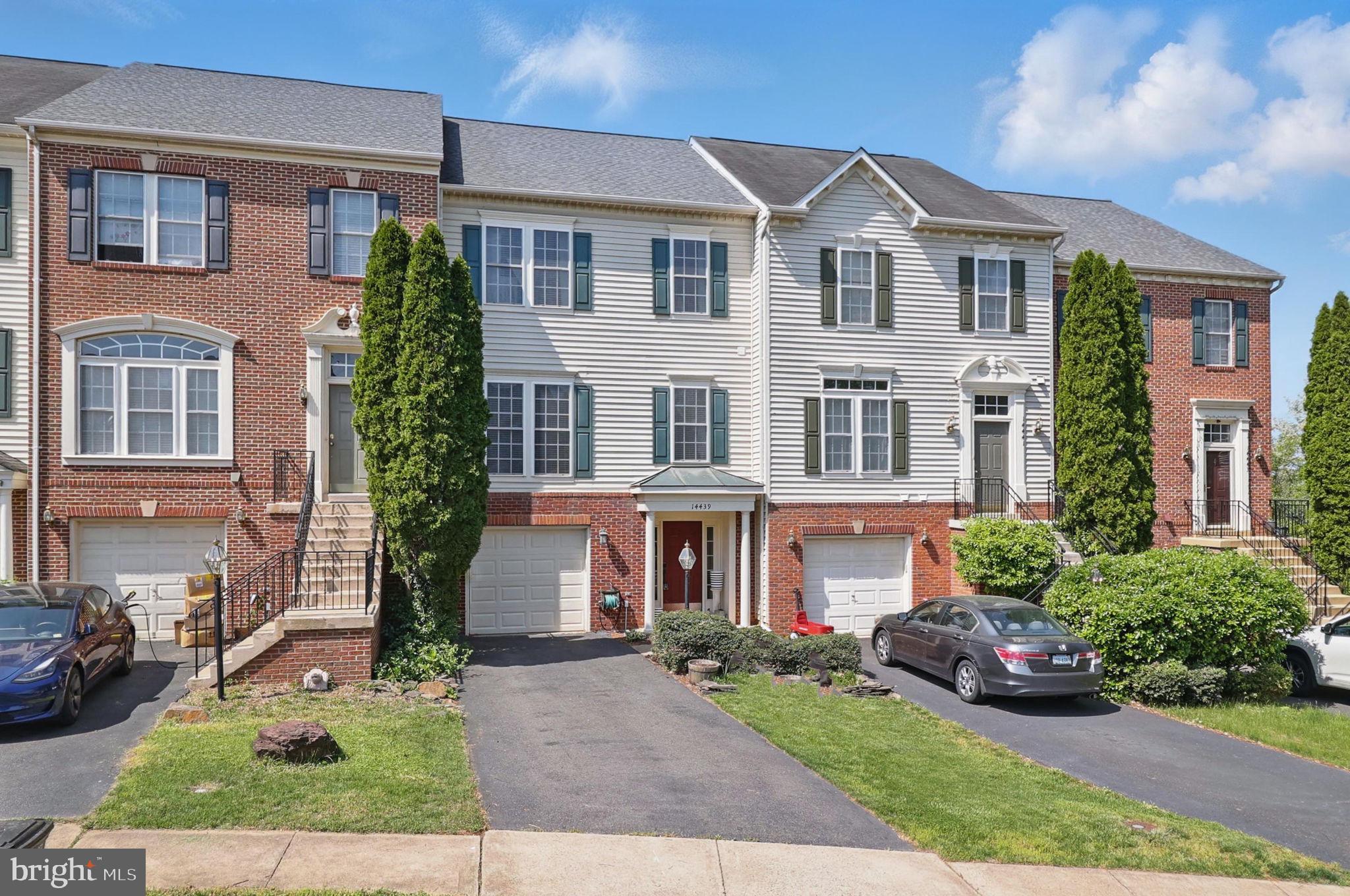 This solid, well-kept home sits on one of the best lots in Virginia Oaks, backing to open green space with long views of Lake Manassas and the neighboring golf course. What was once part of the Virginia Oaks Golf Course is now a quiet common area with walking trails and wooded pockets—ideal for anyone who wants a little space and nature without leaving the neighborhood.

Inside, you'll find hardwood floors on much of the main level, a granite kitchen with good counter space, and multiple living and dining areas that give you options for everyday life or entertaining. Step out to the composite deck and take in the view—no rear neighbors, just trees, trails, and sky.

Upstairs includes three bedrooms and two full baths, including a large primary suite. There’s a half bath on the main level, and a full bath in the finished basement, which also offers space for guests, a gym, or home office setup.

Virginia Oaks is a well-established community with amenities like a pool, tennis courts, clubhouse, and gym, plus quick access to commuter routes, shopping, and dining. It’s a great spot for buyers who want peace and convenience in one package.