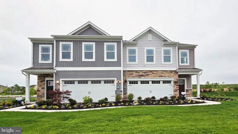 **Red Tag Sales Event through August 2, 2026! Was $369,990  Now: $364,990!** Discover your new home under construction at 9337 Greenway Trail at Coastal Villages in Selbyville, DE. The Brentwood is a stunning 1,676 square foot two-story villa designed for open-concept living that boasts three bedrooms, two and a half baths, and a convenient two-car garage. This home is the epitome of modern comfort. 

As you step into the welcoming foyer, you'll find a handy coat closet and easy access to a well-placed powder room. The heart of the home, a beautifully designed eat-in kitchen, beckons with stylish white cabinetry, a spacious center island perfect for casual dining, luxurious quartz countertops, a pantry closet, and top-of-the-line stainless-steel appliances. 

The kitchen seamlessly flows into the expansive, great room, offering not only a delightful space for relaxation but also direct access to your backyard. Retreat to the generously sized first-floor bedroom tucked away at the rear of the home. Here, an oversized walk-in closet provides ample storage, and laundry hook-ups, while the ensuite bathroom exudes sophistication with its double bowl vanity and spacious shower. 

Ascending the discreetly positioned stairs, you'll reach a landing area that unveils the convenience of an upstairs laundry closet. Two spacious guest bedrooms await, offering comfortable accommodation for family or guests. A second full bathroom and a linen closet add to the upstairs amenities. 

Your new home comes complete with white window treatments, a fully sodded, landscaped, and irrigated lawn, and exclusive America’s smart home® package, ensuring your peace of mind and comfort in every aspect of living. 

Pictures, artist renderings, photographs, colors, features, and sizes are for illustration purposes only and will vary from the homes as built. Image representative of plan only and may vary as built. Images are of model home and include custom design features that may not be available in other homes. Furnishings and decorative items not included with home purchase.