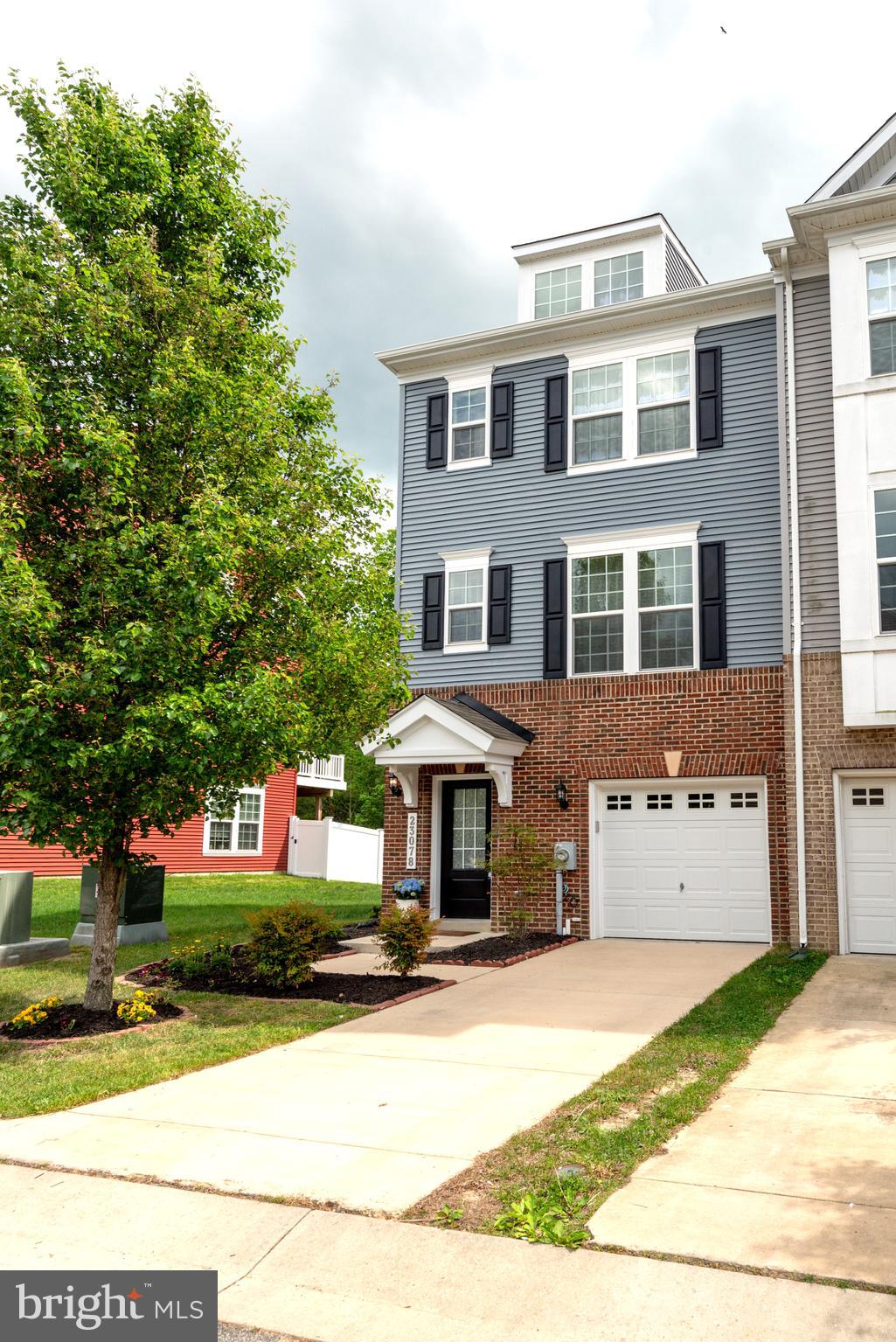 THE OPEN HOUSE PLANNED FOR SUNDAY, MAY 4, FROM 1-3 HAS BEEN CANCELLED.
Welcome to your new home!
This beautifully maintained end-unit townhome offers privacy and comfort, backing to a quiet line of trees. Inside, you'll find a thoughtful layout with three bedrooms and three-and-a-half baths. Upstairs, there are two spacious en-suite bedrooms. The entry-level features a large room with a full bath that can flex as a bedroom, playroom, office, or rec room—whatever best fits your needs.
The main level has an open floor plan where the kitchen, dining, and living spaces flow easily together, perfect for everyday living and entertaining. The gourmet kitchen stands out, with top-of-the-line cabinets, granite countertops, double ovens, a gas cooktop, and a built-in microwave. Step out from the kitchen onto a large deck and enjoy peaceful views of the trees.
Throughout the home, you'll appreciate engineered hardwood floors—there’s not a stitch of carpet anywhere. The owners spared no detail in upgrading this home, right down to the thermostat. It's freshly painted, professionally cleaned, and move-in ready. Plus, there's a single-car garage for added convenience, and natural gas heating for added comfort.  Located in Evergreen Park of Wildewood, this home offers convenience to schools, shopping, Pax River base - everything you need. 
Come see how easy and comfortable life can be here!