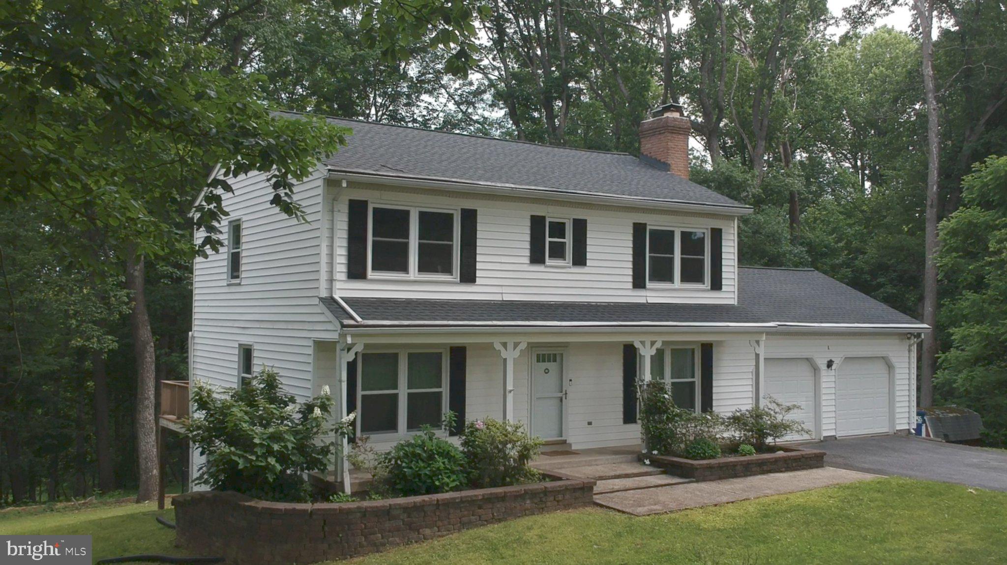 Tucked away at the end of a quiet cul-de-sac and surrounded by mature trees, this beautifully updated colonial offers the perfect combination of privacy, comfort, and natural beauty on nearly two acres backing to parkland.

Significant recent improvements include replacement windows throughout the home (excluding the basement) and a new roof installed in September 2024. Additional updates throughout the property help create a move-in ready experience.


Inside, you'll find a warm and inviting floor plan highlighted by a stunning stone fireplace, beamed ceiling, and spacious living area designed for everyday living and entertaining. The updated kitchen features modern cabinetry, updated appliances, and convenient access to the informal dining area and expansive rear deck overlooking the peaceful backyard setting.

The main level also offers a flexible bedroom or home office, a convenient powder room, and direct access to the oversized two-car garage.

Upstairs, the spacious primary suite includes a renovated bath, walk-in closet, and sitting area. Two additional generously sized bedrooms and an updated hall bath complete the upper level. In September 2023, the stairs and entire second floor were upgraded with attractive laminate wood flooring, creating a cohesive and low-maintenance living space.

The finished lower level provides additional flexibility with a recreation room featuring a wood stove, an additional bedroom, full bath, and laundry area.

The setting is truly special. Enjoy the peace and privacy of a spacious lot with comfortable separation from neighboring homes, mature trees, and direct access to the natural surroundings. Residents appreciate the quiet atmosphere, scenic environment, and convenient location near local shopping, dining, and commuter routes.

This property offers a rare opportunity to enjoy updated living spaces, a private natural setting, and the charm of Mount Airy all in one exceptional home.

Feature Call-Outs for Marketing

Privacy Meets Convenience
Enjoy nearly two acres backing to parkland with mature trees and comfortable separation from neighboring homes.

Major Recent Updates
Laminate wood flooring (2023), replacement windows (2024), roof (2024), updated kitchen, renovated baths, HVAC updates, and more.

Room To Live
Flexible spaces include a main-level office/bedroom, spacious primary suite, finished lower level, and oversized garage.

Nature Right Outside Your Door
Quiet cul-de-sac location with wooded views, abundant privacy, and access to the outdoors while remaining close to everyday conveniences.