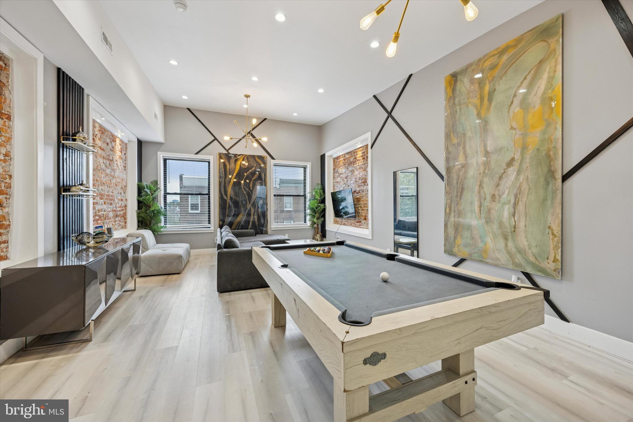 Welcome to 3111 West Diamond Street, a stunning high-end rehab in Philadelphia’s 19121. This triplex gem boasts Unit 1 with three bedrooms, Unit 2 with two bedrooms, and Unit 3, a flexible one-bedroom that can convert to two. Exposed brick, accent walls and ultra-modern luxury finishes elevate every space. Each bedroom shines with its own accent wall, while bathrooms dazzle with top-tier fixtures. A fully finished basement and beautiful backyard add perfect touches for living or hosting. Move-in ready, this is Philly living redefined.