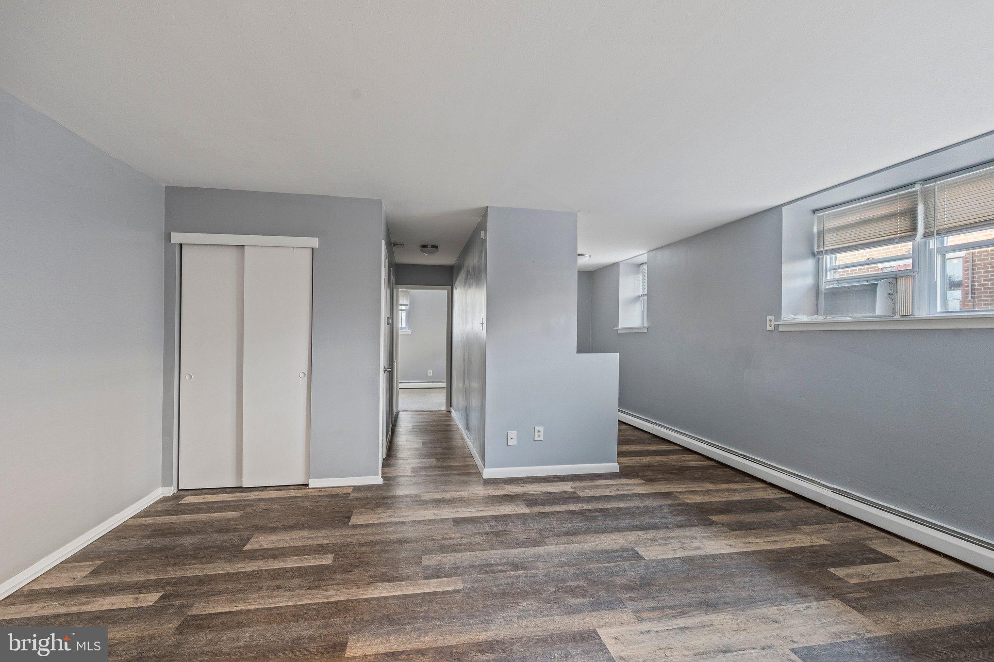 This lower lever 1-bedroom 1-bathroom unit blends updated finishes with original character. Enjoy  modern gray vinyl flooring, and fresh paint throughout, offering a sleek, move-in ready feel. The bathroom retains its vintage charm with classic green tile and a brand new bathtub for your comfort. Shared coin-operated laundry on-site. Located in a peaceful building on Rhawn Street, Unit 4A offers easy access to local conveniences and public transportation—just in time for summer living! First month’s rent, last month’s rent, and security deposit due at lease signing. 

Mandatory Requirements: Rent: $1,100/month + Electric, 600 or higher Credit Score, Proof of 3x Rental income and Rental history verification required. No co-signers. NO EVICTIONS .