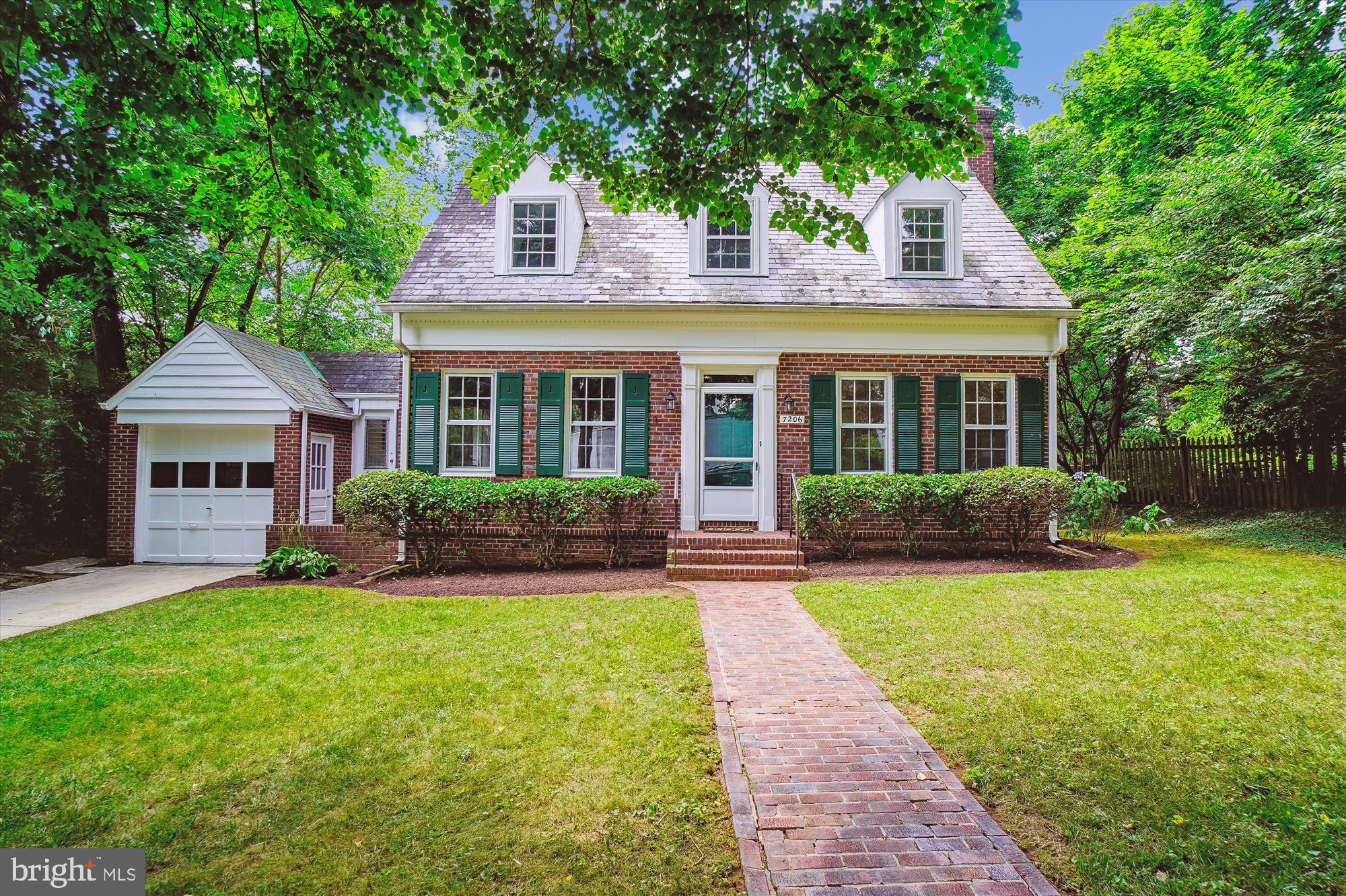Nestled on a tree-lined street in Martins Addition, this classic Williamsburg Colonial is ready to become your new home. Situated on a large lot with ample room for expansion, this property offers both space and potential.
A brick walkway leads to the welcoming front door and into the center hall foyer. Inside, you'll find refinished hardwood floors and freshly painted walls throughout. The spacious living room features a wood-burning fireplace and views of both the front and back yards. The formal dining room is perfect for hosting dinner parties and family gatherings, while the updated kitchen connects to an eat-in room that bridges both the kitchen and dining room. A convenient powder room is also on the main level.
Upstairs, the spacious primary bedroom is complemented by two additional well-sized bedrooms, an updated full bathroom and a linen closet.
The finished basement includes a full bath, a recreation room, a utility area, and flexible space ready to be customized to your needs. Outside, the slate patio in the private backyard offers a serene setting for outdoor enjoyment.
This property is ideally located within minutes of Brookeville Market, a pharmacy, Olympia Café, Rock Creek Park trails, Candy Cane City, and Shepherd Park, and local commuter routes.