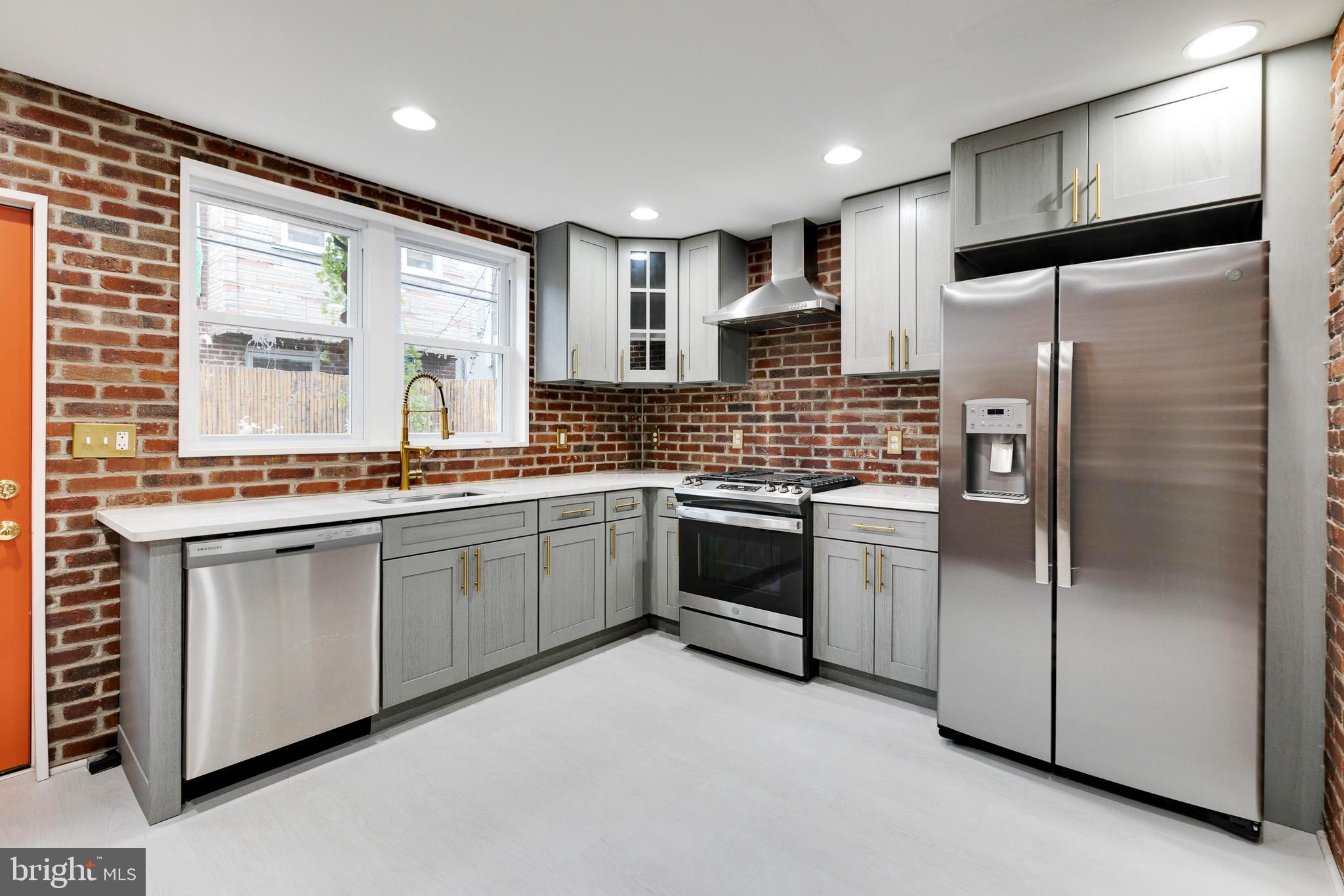 Updated  2 bed 2.5 bath home features high end finishes . A custom bricked kitchen with stainless steel appliances  leading out to a patio, engineered floors,  with a  half bath on main floor with a separate  large living /dining room combination. The  beautifully forged staircase leads to   2 large bedrooms and the primary  bedroom can comfortably accommodate  a king size bed and has 2 large closet  and the bath has tile floor with  large glass standing shower.  The 2nd bedroom can accommodate a queen size bed and one large closet and the hallway  bath has a tile tub shower combo.Approximately 1200 square feet of above grade living space plus a  finished basement  with 7' ceiling  and additional  storage , washer and dryer included in the sale.  Brand New  Roof 2 years ago !!! Walking distance to Passyunk ave, restaurants and public transportation.
