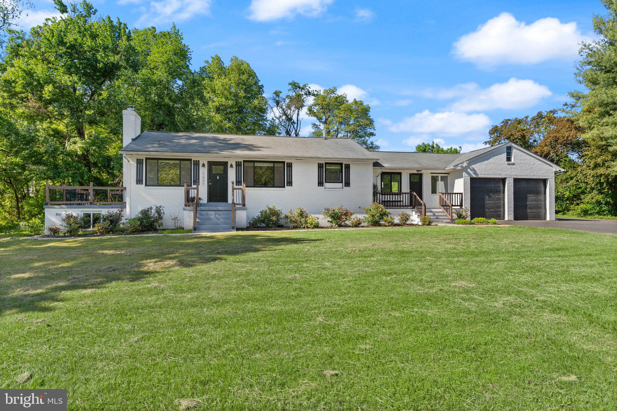 Escape to a peaceful country setting without leaving convenience behind. This inviting ranch-style home sits on a picturesque 1-acre lot with tranquil lake views and private access shared only with nearby neighbors and no HOA.

Step inside to discover a warm, updated interior that blends character with modern touches. The kitchen is a standout with its farmhouse sink, quartz countertops, stainless steel appliances, and a custom coffee bar. Whether you're cooking dinner or pouring a glass of wine from the built-in rack, this space was designed to be both stylish and functional.

You'll love the cozy living room with hardwood floors and a wood stove, as well as the bright family room that overlooks the water. With fresh paint throughout, newer carpet in the bedrooms, and beautifully remodeled bathrooms, the home feels move-in ready while still offering that lived-in comfort.

The fully finished basement gives you even more room to spread out—create a home gym, office, media room, or all of the above. Outside, relax on the deck, enjoy the wooded views, or take a quiet stroll down to the water. A two-car garage and updated systems (including a Nest thermostat, new furnace, and windows) complete the package.

This home is where peaceful living meets modern upgrades! More photos will be added soon. Please check back for updates.
