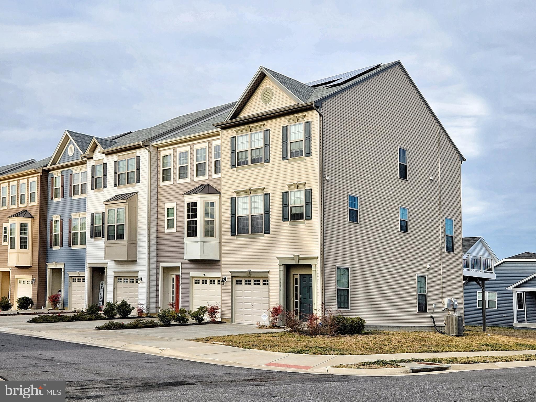 ** Beautiful End Unit Townhouse!  **  3 Bedrooms and 3.5 Baths.  **   Composite Large Deck. ** Light and Bright for 6 Windows on the side of the home. ** Two Large Master Suite with Luxury Baths on Upper Level. ** Large Bedroom with Full Bath in the Walkout Basement.  ** 
Kitchen has SS Appliances, Lots of Cabinets, Spacious Pantry and Breakfast Nook leading to Maintanace Free Large Deck.  **  Island in the Kitchen. ** New Washer & Dryer will be delivered.  ** High Ceiling!  ** 3 Ceiling Fans.**  9 New Faux Blinders just installed!  ** 1 Car Garage with 2 Driveway Parking.  ** Lots of Visitor Parking. **  New Community and Built in 2019.   ** Great Comminity with Pool, Play Ground, Walking Trail, and Pier/Dock.  **  5 Minutes to VRE Station and 10 Minutes to Downtown Fredericksburg. ** Warm and Lovely Home!  ** Please wear shoe covers provided for showing.
