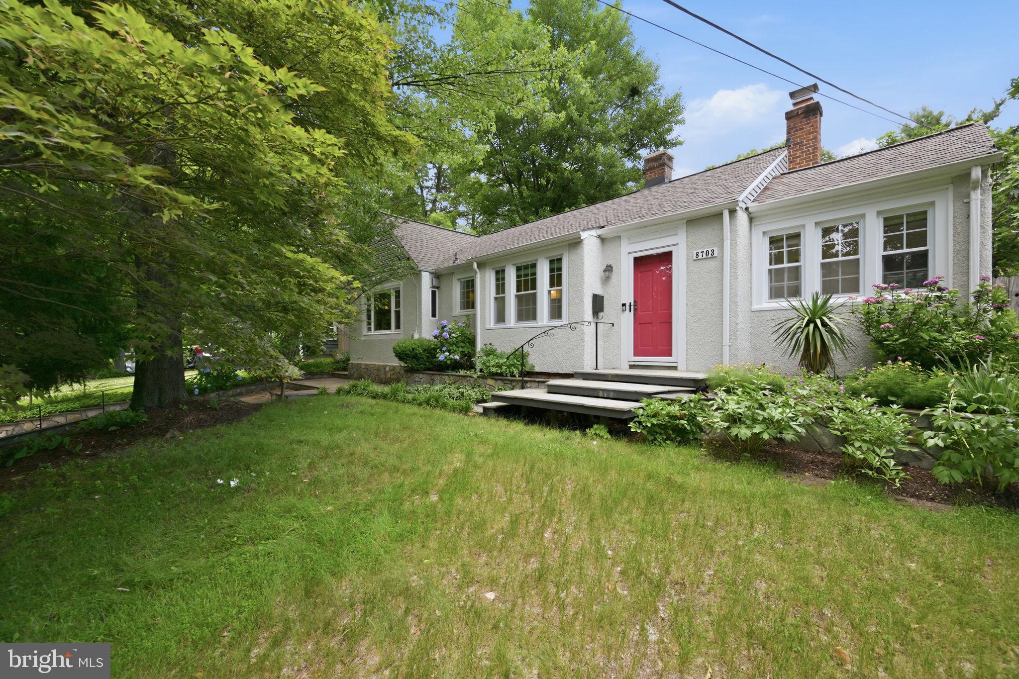 Welcome to 8703 Reading Road, a beautifully maintained cottage-styled rambler offering the ease of one-level living in an unbeatable Silver Spring location. This charming home features three spacious bedrooms, each with its own private ensuite bathroom, plus an additional half bath for guests.

Inside, you'll find freshly painted interiors, hardwood floors throughout, and a thoughtful layout designed for both everyday living and entertaining. A cozy sitting room off the main living area provides the perfect space for a home office or quiet retreat. The bright three-season room (**not included in square footage of home!**) offers an ideal spot to enjoy your morning coffee while overlooking the lush backyard.

Outside, mature landscaping, blooming fig trees, and abundant greenery create a private oasis. The fully fenced backyard features two patios, making it perfect for hosting gatherings or relaxing outdoors. A backyard shed with electricity provides excellent storage or workshop potential.

Recent improvements include attic re-insulation (2025), crawl space encapsulation (2025), and a new washer and dryer (2025).

Located just steps from Sligo Creek's trails and parkland, this home also offers easy access to downtown Silver Spring's restaurants, shops, and entertainment. The future Purple Line Manchester Place Station will be just moments away, adding even more convenience and connectivity.

This is a rare opportunity to enjoy spacious one-level living, modern updates, and an exceptional location all in one.