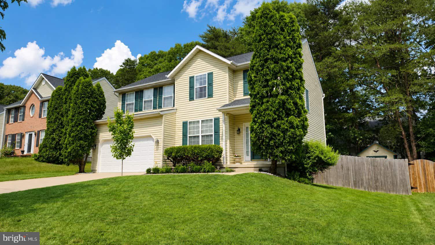 Welcome to this beautifully updated 4-bedroom home nestled in the established Jason’s Landing community, offering an incredible community pool and clubhouse with adjoining park and playground space. This wonderfully cared for home boasts HVAC replaced in 2023,  roof replaced  in 2020 with 50-year architectural shingles, and a new garage door and shutters in 2026. The first floor features light-filled 9-foot ceilings over a gleaming solid hardwood floor. The inviting layout allows for personal touches in curating spaces for living, dining and home office uses. The fully renovated kitchen is equipped with a gas range and stainless-steel appliances and is open to the family room accented by a gas fireplace. From the heart of the home, you are just a few steps to the attached deck, which looks over a spacious and private backyard paradise, featuring mature shade trees, winding pathways, low-maintenance perennials and ground cover, and a cozy firepit area perfect for relaxing or entertaining. A large finished shed with electrical service can function as a studio, toy storage or personal retreat, with easy street access through the double gate. The second floor offers 4 spacious bedrooms off a wide hallway. The primary suite includes a large ensuite bath with double vanity and corner spa tub, large walk-in closet with upgraded built-ins. The convenient upstairs laundry enhances the second story layout. Car enthusiasts & hobbyists will appreciate the spacious two-car garage with ample cabinetry and a high ceiling. And the moveable hydraulic car lift can be included with your offer! Enjoy weekends at nearby Severn-Danza Park,
featuring walking trails, sports fields and courts, and a BMX track. This home is conveniently located near MARC train service, Fort Meade, NSA, and BWI Airport, with easy access to Washington, D.C., Annapolis, and Baltimore. Highly-rated Anne Arundel County schools are a huge plus!