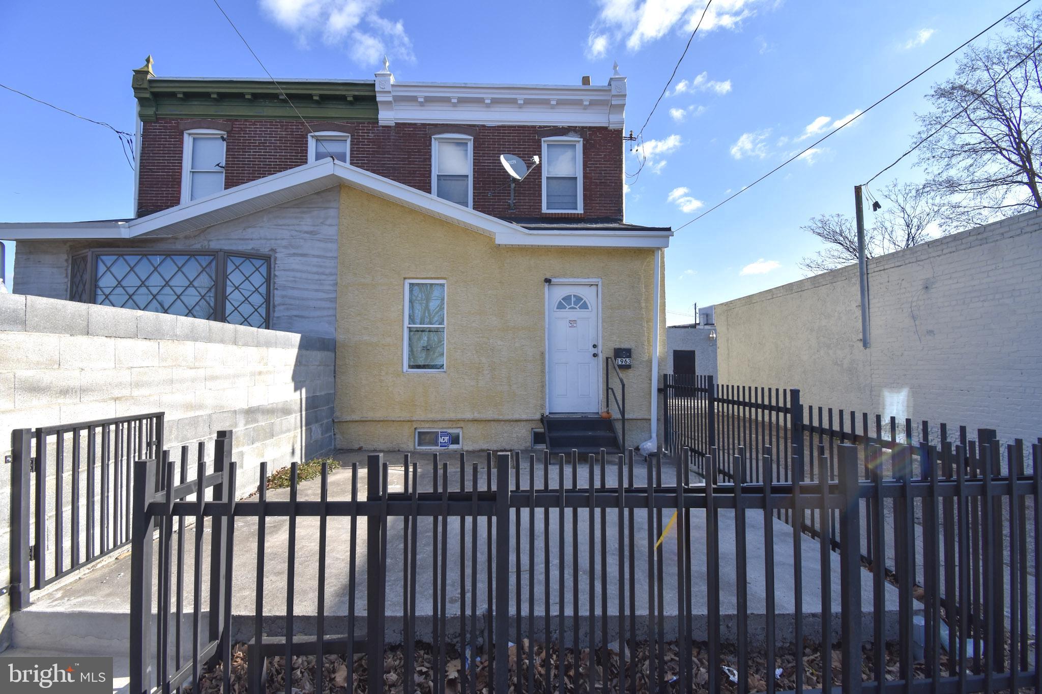 Mixed-use investment property featuring 36 non-climate storage units plus a 4 bed, 2 bath single-family residence, located on a 10,800 SF lot in Northeast Philadelphia. The storage units are approximately 8’ x 16’ (128 SF) and are a mix of roll-up garage doors and standard entry doors. Units are currently vacant, allowing a new owner to lease up at market rents and implement their own operating strategy. Simple, low-overhead facility with outdoor access. The single-family house is tenant-occupied providing in-place residential income. The interior condition is functional but dated and cluttered; property is being sold as-is. Additional features include a small paved area that can accommodate two parking spaces, suitable for tenant or storage use. This is a value-add opportunity for investors or owner-operators seeking a small storage facility with residential income.