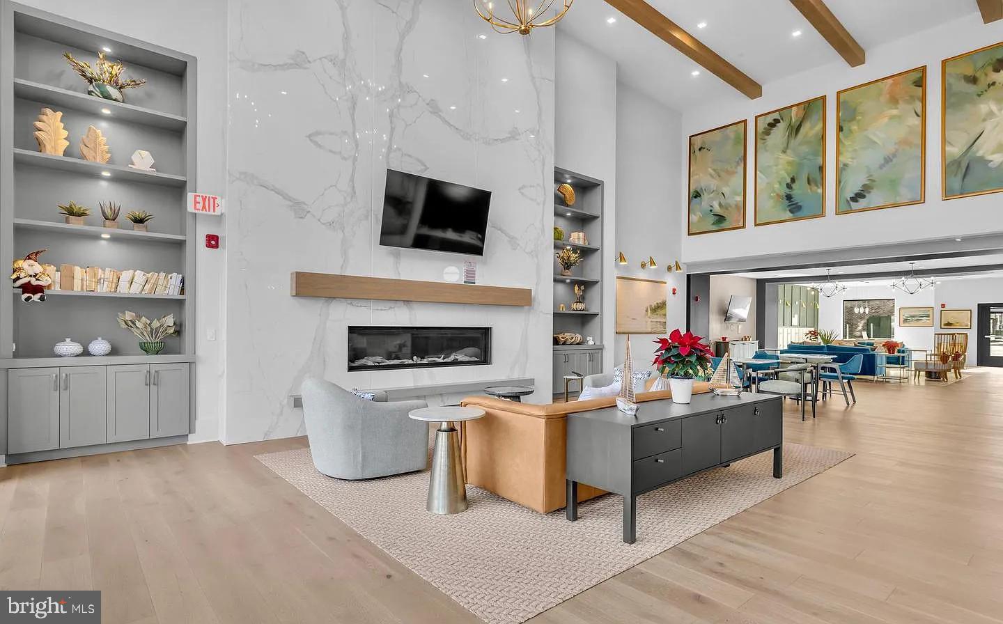 ***PRICE REDUCED - SELLER MOTIVATED***
BY APPOINTMENT ONLY.
55+ Luxury 2-bedroom/den with balcony in an elevator condo building. THE ELEMENT boasts a variety of amenities to satisfy an active adult community. Natural light floods into the modern kitchen with white cabinetry, tiled backsplash, SS appliances & quartz countertops. Enhanced lighting & recessed lights throughout. Upgraded closet design w/a huge Master closet! Beautiful, light colored LPV flooring (no carpeting). Custom bathroom design with upgraded tilework. Double vanity in the master bath. Private balcony for sipping your morning coffee. Beautifully landscaped perimeter with a walking trail/path. Elegant lobby with automated golf room & pool table. Enjoy pickleball, dog park, outdoor grills & workout equipment.  Assigned outside parking(Space#4) & lower-level storage unit(#20) included. (Wallpaper is peel-and-stick). Call today to see this great property with amenities galore! Quick drive to downtown Annapolis, waterfront dining, shopping & the Bay Bridge.