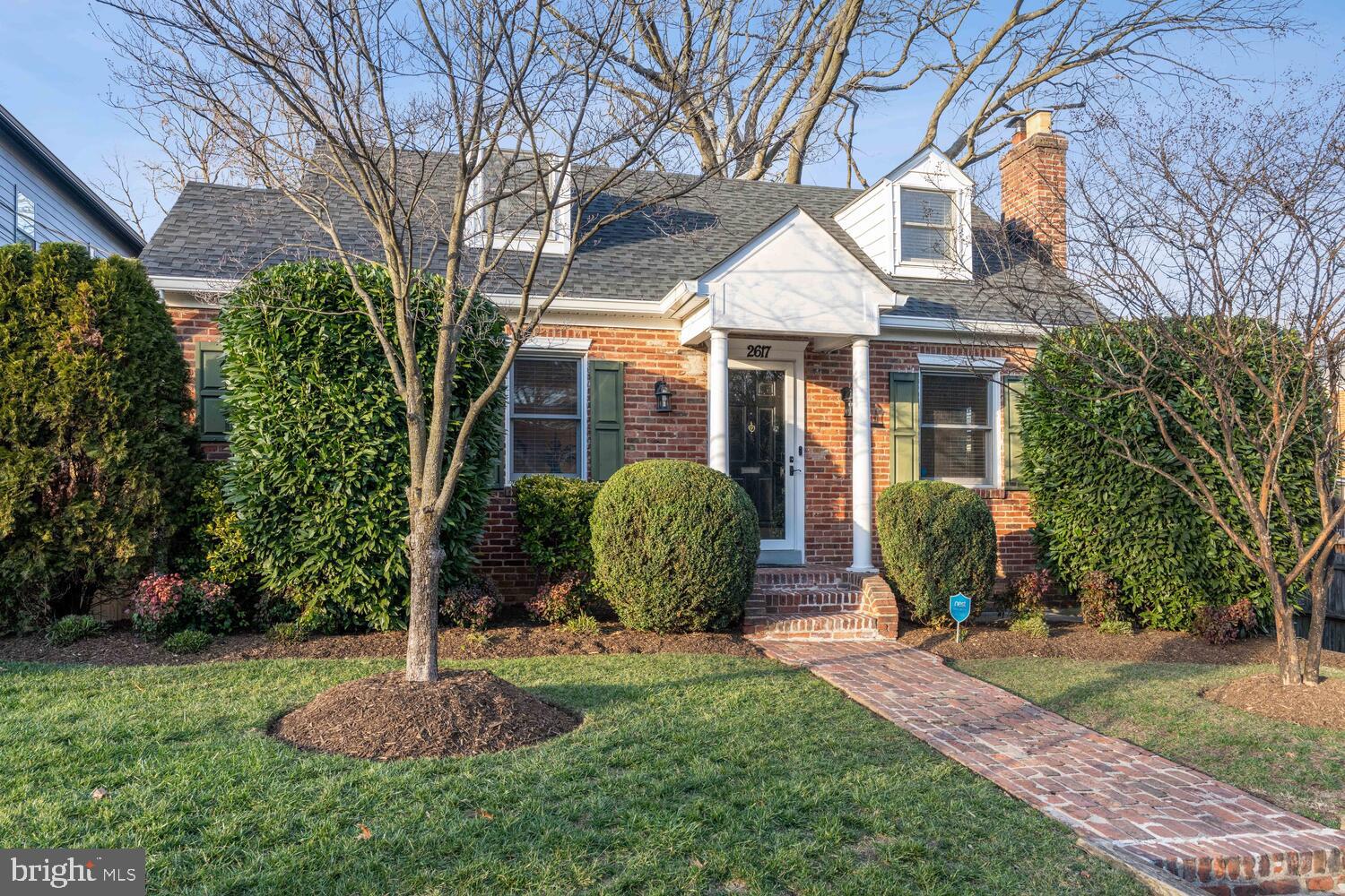 Classic Arlington Charmer loaded with updates just 3 blocks from the Pike! This move-in ready, 3 bedroom 3 bathroom brick Cape features refinished hardwood floors & fresh paint throughout.  An inviting living room boasts a handsome wood-burning fireplace. The efficient kitchen beckons all cooks and includes granite counters, table space & stainless steel appliances. Entry-level bedroom, full bath, and separate dining room round out the main level.  Lots of windows, lots of light! Upstairs features a spacious primary, full bath, additional loft space, and a third bedroom. The fully finished basement features a laundry room, a third full bath, and a den. New HVAC, roof, and much more (see list of improvements). The backyard has a large deck and fully fenced yard that’s perfect for entertaining, for 2-legged and 4-legged friends alike! Convenient location with shopping and restaurants along Columbia Pike just 3 blocks away. Easy access to Clarendon, DC, and National Airport all less than 5 miles away.