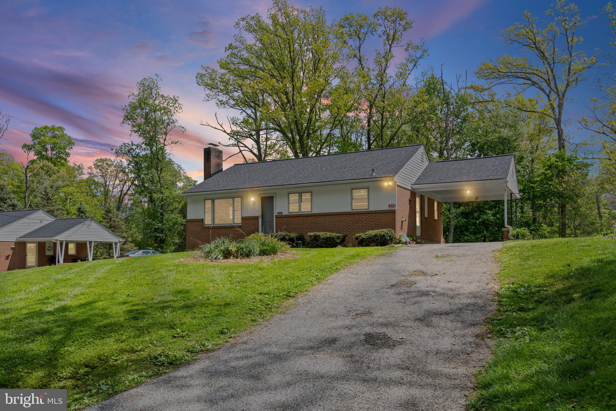 Great opportunity to lease a rancher with carport in the beautiful serene community of Upperco in Hereford. This all-brick one level living home has been freshly painted, and the open floor plan is a great space to entertain family and friends with hardwood flooring in the living and dining room. The room features a large picture window, and a wood burning fireplace to keep you and your guests warm in the colder months. The eat-in kitchen has electric cooking, microwave, and ample cabinet space for all your necessities. There are 3 generously sized bedrooms down the hall, and a full bathroom with a tub and shower.  The lower level is partially finished with a room that can be used as an office, media or rec space. There is also a spacious utility room with a quarter bathroom, laundry, and extra storage. Enjoy spending time outside in the backyard with lots of space for recreation and summer barbecues! There is plenty of parking for all your guests in the driveway.  Located a short drive to Rte 88 to access shopping, dining and services, you will not want to miss out on leasing this home! Schedule your tour today!