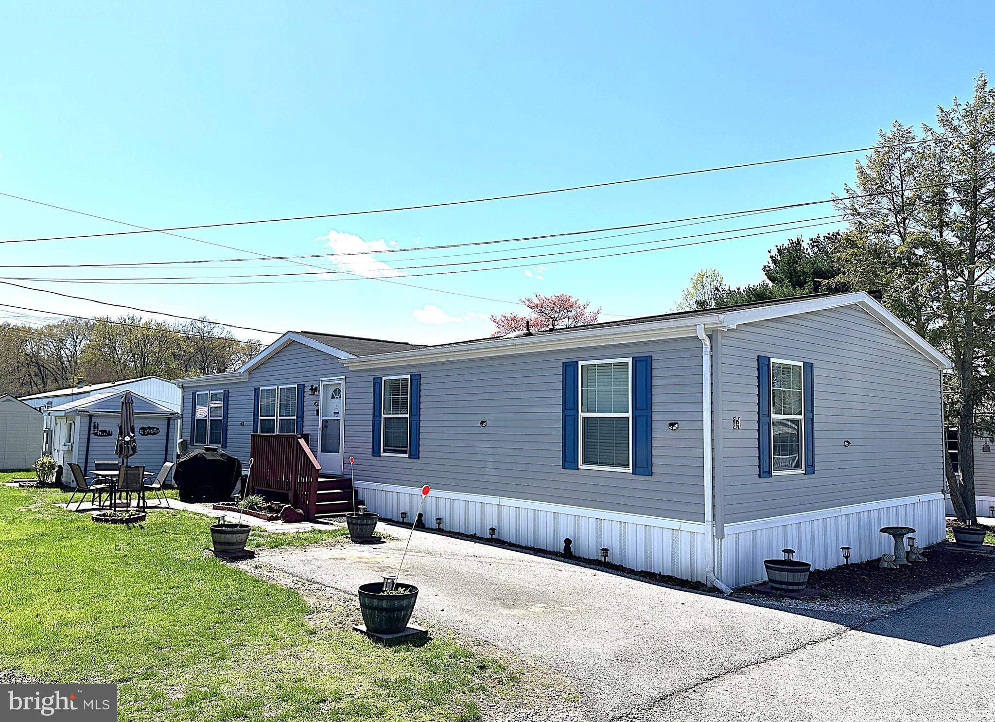 Beautiful and Spacious Double Wide in a Great Odenton Location! Over 1700 Square Feet of Living Space with Many Nice Updates Including Luxury Vinyl Plank Throughout the Main Living Area, Stainless Refrigerator, Dishwasher and Built-in Microwave and New Paint Throughout. Inside this home Features a Large Kitchen with lots of Cabinets and Counter Space Leading Through the Formal Dining Room to a Big Family Room with a Fireplace. You have a Nice Sized Formal Living Room. A Big Primary Bedroom with a Private Bathroom and Walkin Closet. Good Sized 2nd and 3rd Bedrooms. There are Ceiling Fans in Every Room. Outside is a Nicely Landscaped Yard with a Driveway, Patio and Shed. Close to Schools, Parks Shopping and Restaurants. Minutes to Ft Meade and the MARC Train Station. Don't mis out on this one. Contact me today for Private Viewing.