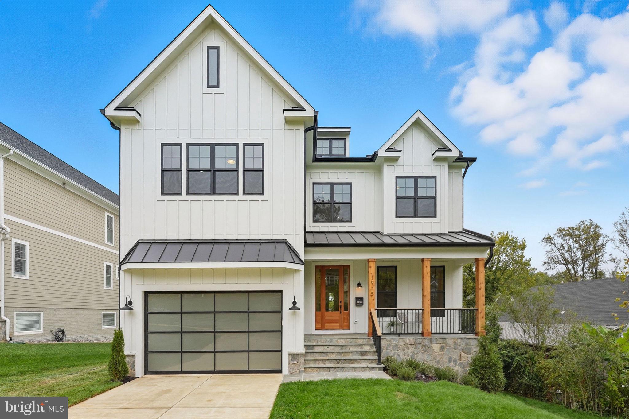Welcome to this stunning, newly built modern Craftsman, where elegance, comfort, and convenience meet. Spanning three meticulously finished levels, this 6-bedroom, 6.5-bath masterpiece is beautifully designed for luxurious living and effortless entertaining.

From the moment you arrive, a charming covered flagstone front porch welcomes you, leading to a grand fir entry door with sidelights. Inside, discover soaring 10’ ceilings, wide-plank European white oak hardwoods, and exquisite custom craftsmanship throughout. The gourmet chef’s kitchen is a showstopper, featuring Jenn Air stainless steel appliances including a built-in 48” refrigerator and 48” gas range, Delta pot filler, Luma Taj quartz countertops/backsplash, designer cabinetry, and under cabinet lighting. Entertain with ease in the formal dining room, or gather in the inviting living area with a cozy gas fireplace.

A spacious butler’s pantry with a dual-zone beverage center and walk-in pantry provides abundant storage and prep space, perfect for hosting. The main level also offers a private office and a separate main level ensuite.

Upstairs, retreat to the luxurious owner’s suite with two walk-in closets and a spa-inspired bath featuring a wet room with soaking tub, skylights, dual vanity, and designer tile. Three additional ensuite bedrooms, a versatile loft, and a well-appointed laundry room complete the upper level.

Enjoy endless possibilities in the fully finished lower level, offering a media room, recreation room with wet bar and beverage center, plus a sixth ensuite bedroom. Step out to your private, backyard oasis complete with a TimberTech deck and Impression railings, gas line for grilling, lush landscaping, and mature trees.

Built for lasting comfort and peace of mind, this home features dual-zone Trane HVAC, a 75-gallon gas water heater, two 200-amp panels, Andersen windows, architectural shingle roof, Sonos surround sound with 10 built-in speakers, and CAT6 wiring throughout.

Unbeatable location with quick access to West Falls Church Metro (1.5 miles), Tysons Corner (5 minutes), Route 66, 495, 270, and the Dulles Toll Road for effortless commuting to Falls Church City, Arlington, and D.C. Enjoy the convenience of Whole Foods, Trader Joe’s, and Starbucks just moments away.

This move in ready dream home offers the ultimate blend of style, space, and location ready for you to make it your own!