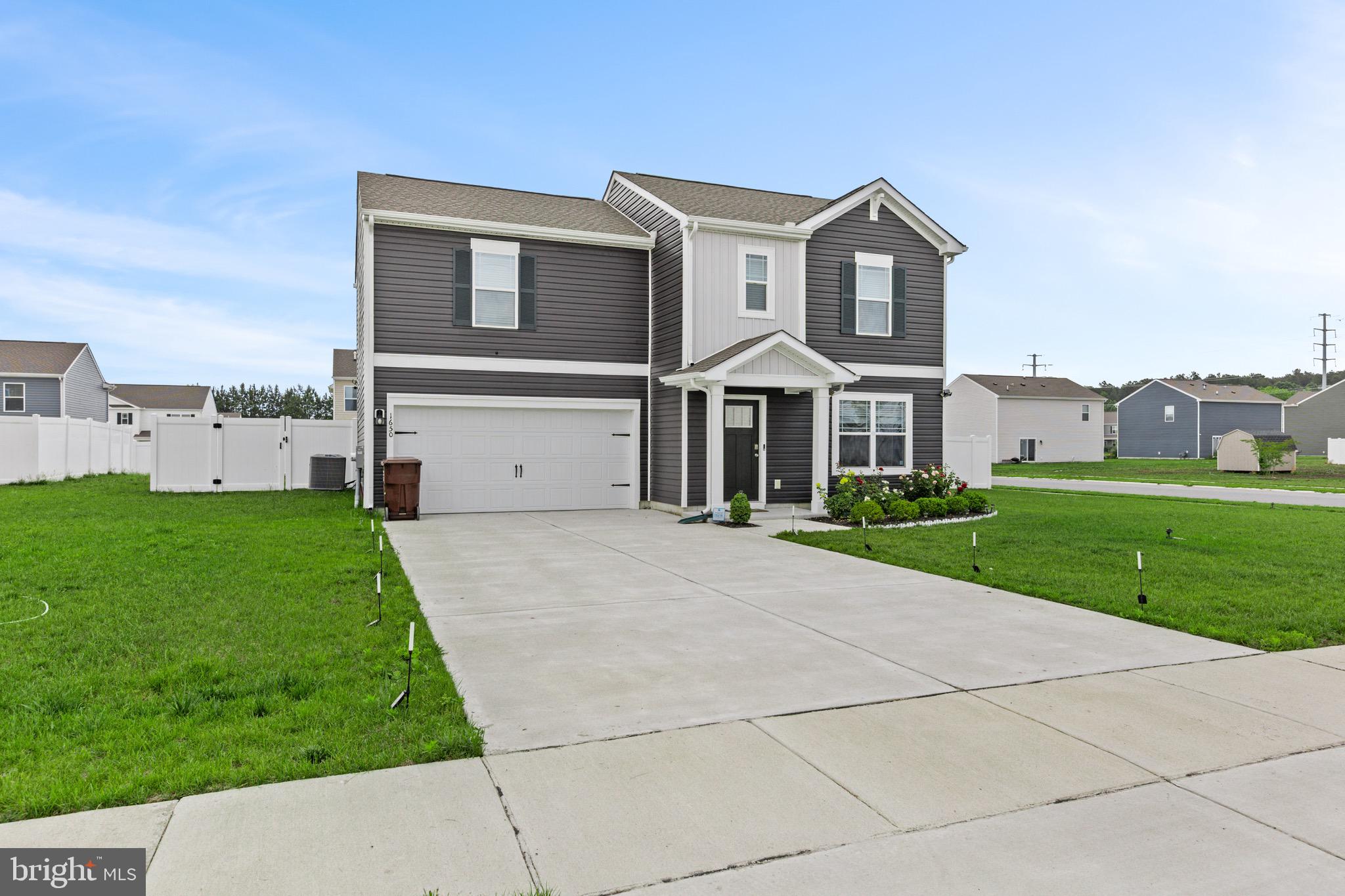 Welcome to Blackwater Landing! Built in 2024 by DR Horton, this beautifully maintained 4-bedroom, 2.5-bath home offers modern living with all the benefits of new construction—without the wait. Situated on a desirable corner lot, this home features an open-concept floor plan with granite countertops, stainless steel appliances, and plenty of space for everyday living and entertaining. Upstairs, you'll find all the primary suite along with 3 additional bedrooms and shared full bath. You'll love the conveniently located second-floor laundry room. Step outside through the sliding glass doors to enjoy the fully fenced backyard featuring a new privacy vinyl fence—perfect for relaxing, pets, or outdoor gatherings. Additional highlights include a spacious 2-car garage, attractive curb appeal, and beautiful rose bushes that enhance the front mulch beds. With modern finishes throughout and only a couple years old, this move-in-ready home is waiting for its next owner to make it their own.