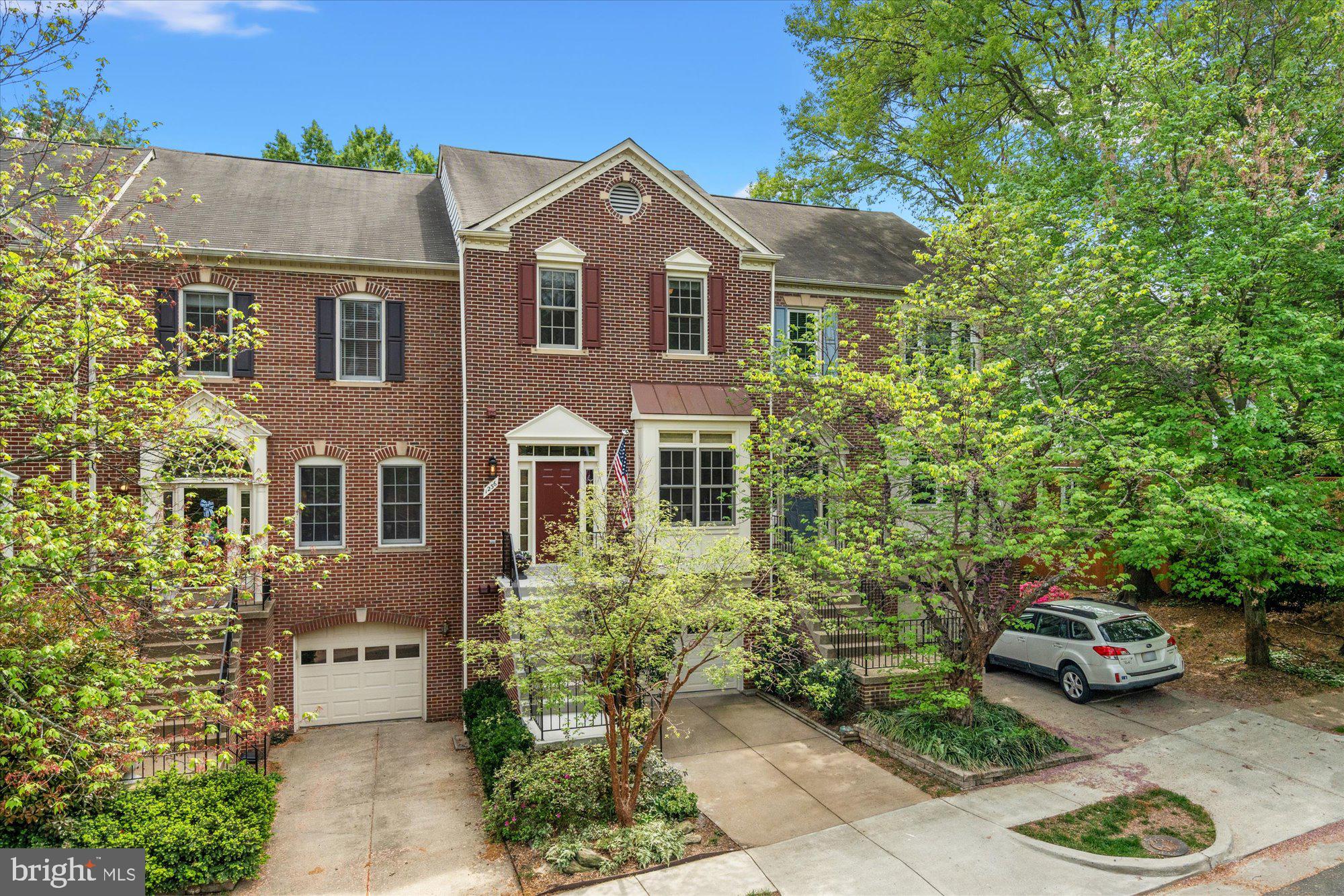 Welcome to 1236 Dartmouth Road, where pride of ownership is apparent with nearly every aspect of the home improved and professionally maintained.  This updated 3-level garage townhome is located on a quiet street and offers 3 bedrooms, 2 full and 2 half bathrooms.  As you approach the home, the thoughtful landscape by Campbell & Ferrara immediately catches your eye.  Refreshed and repainted exterior stairs, railing, lighting, trim and front door enhance the exterior.  

Inside on the main level you are greeted with 9 ft ceilings, recessed lighting, gleaming hardwood floors, crown molding and neutral paint colors.  The high quality aluminum-clad windows replaced in 2017 bath the home in natural light.   Gracious living and dining areas offer plenty of space to entertain.  The eat-in kitchen was completely remodeled and features Ultracraft-Destiny soft-closing cabinetry with task lighting, granite counters with a leather finish (just resealed), tile backsplash, Kohler enameled cast iron undermount sink, GE Cafe stainless steel appliances (refrigerator 2023), Minka ceiling fan, Hunter Douglas blinds, & a bonus wall-mounted TV.  

From the kitchen an Anderson sliding glass door leads you to a Trex deck with illuminated stairs that go down to a professionally landscaped rear patio oasis.  A new privacy fence surrounds this lovely outdoor space complete with landscape lighting, irrigation system, a soothing fountain and a covered deck with ceiling fan.  Integrated storage under the stairs is perfect for any outdoor supplies.  

Upstairs the primary suite features a vaulted ceiling with Hunter fan, abundant closet space with automatic lighting outfitted by California Closets, and an ensuite full bathroom featuring a marble vanity with dual sinks, soaking tub and separate shower.  Two additional bedrooms, served by an updated hall bathroom, are located opposite the primary bedroom and feature vaulted ceilings - one even has built-in storage above a custom California Closet that is accessible via library ladder!  

The lower level offers a cozy family room with a wood burning fireplace, updated half bathroom, and an impeccable laundry area with full-size stackable LG washer and dryer, Kohler utility sink and storage cabinetry.  The garage includes helpful storage racks plus built-ins and work area so everything has its place.  

Located in the Quaker Hill development, residents enjoy a tranquil waterfall and pond with a walking trail and access to the community pool is included.  The convenient location puts groceries, shopping and dining within walking distance and Old Town, 395 and 495 can all be easily accessed in minutes.  Inquire with listing agents for a full list of features and upgrades.