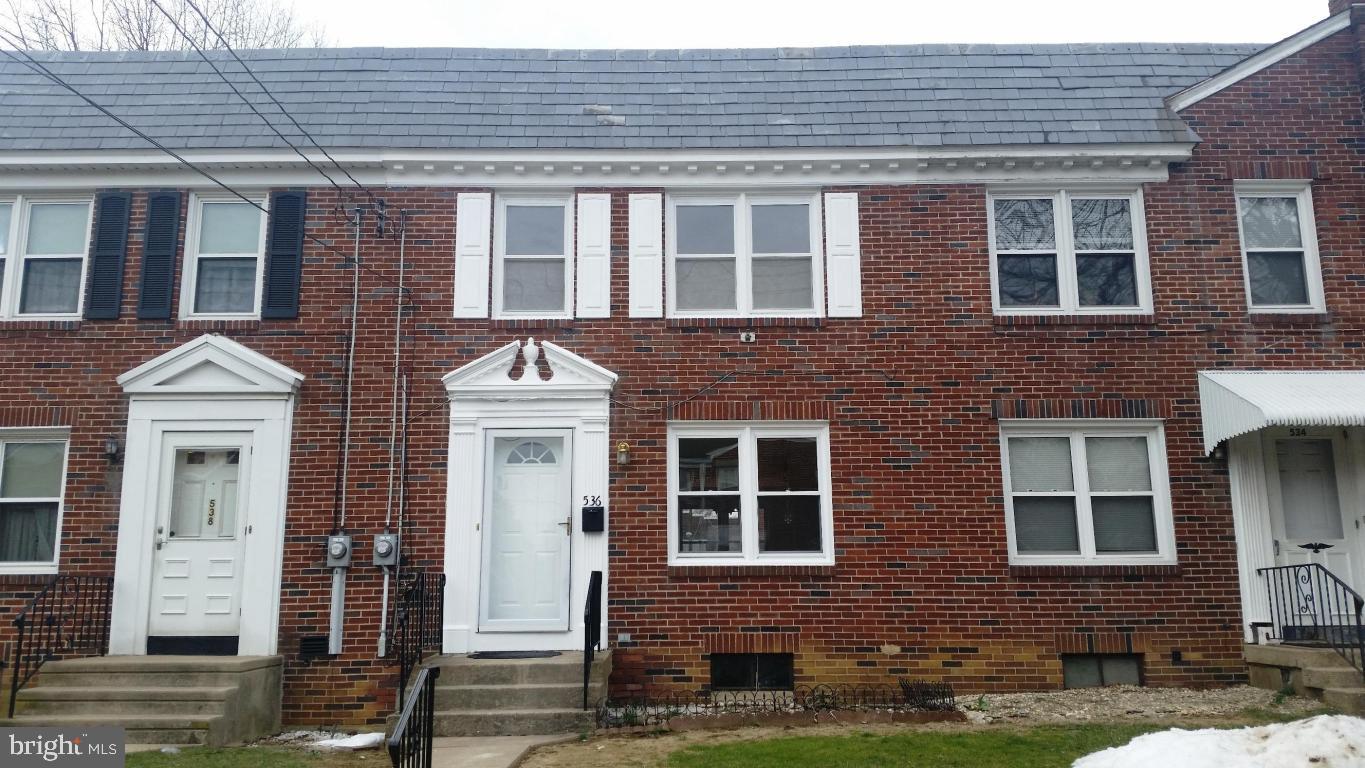 Move in ready brick row home on a quiet side street. Home features new paint, kitchen cabinets, appliances and fixtures, new bath vanity and fixtures. Tile flooring throughout the first floor. Full basement with walkout to fenced yard. Gas heat and central air. Check this one out.