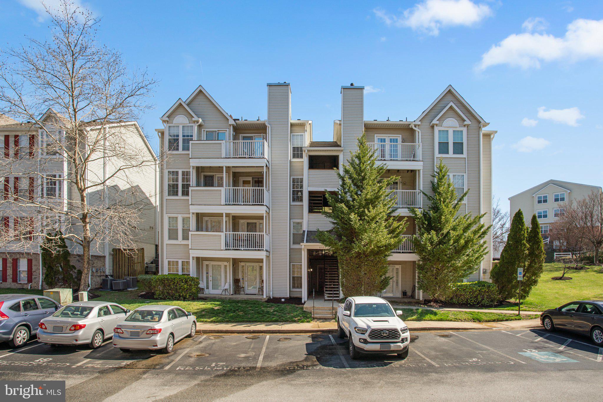 Updated two-bedroom condominium with two bathrooms in a convenient Elkridge/ Howard County location!  Sunny, third-floor move-in ready home with a neutral color palate, freshly updated chic bathrooms, new paint, and carpeting! Spacious, open floorplan - kitchen with granite countertops and stainless steel appliances opens to the living room with hardwood floors, fireplace, and a balcony. Two generously sized bedrooms and two full bathrooms.