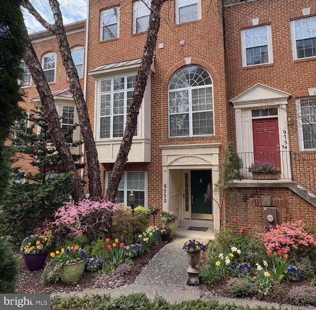 Impeccably cared for,  this stunning four-bedroom, 2 full and 2 1/2-bath townhouse offers the perfect blend of space, style, and functionality across multiple thoughtfully designed levels.

Enter on the main level where you’ll find a versatile bedroom or home office paired with a 1/2 bath, ideal for guests or work from home, A convenient laundry area is tucked into the closet on this level, adding everyday ease and functionality.
The next level features a beautifully redesigned kitchen with a dedicated eating area. Expanded by inches, the peninsula now offers additional cabinetry, including glass-front shelving with lighting, perfect for both display and storage. The kitchen flows seamlessly into the dining and living spaces through architectural openings, creating a sense of connection while still maintaining distinct, defined areas.
 The main level is enhanced by rich wood flooring, adding warmth and continuity throughout. The living room is anchored by a fireplace, creating a cozy focal point for everyday living and entertaining. Step outside to a recently renovated deck overlooking beautiful green space, offering a private and peaceful outdoor retreat.

Upstairs,  the bedroom level includes two spacious bedrooms with a shared full bath. The next level is dedicated to a magnificent primary suite, featuring a beautifully renovated primary bathroom (updated within the last five years).  Just a few steps above, an additional loft creates a flexible space perfect for a sitting area, nursery, home office, or more.
Every bedroom features custom-built closets, maximizing storage and organization. Filled with natural light throughout, this home offers abundant storage, thoughtful upgrades, and a layout that balances openness with defined living spaces.

Located just steps from Rio and Downtown Crown, enjoy an abundance of shops, restaurants, and everyday conveniences, all without ever getting in your car. Situated within the highly desirable Wootton High school district, this home offers both lifestyle and location.

A rare combination of space, updates, walkability, and top-tier schools, this is one you won’t want to miss.