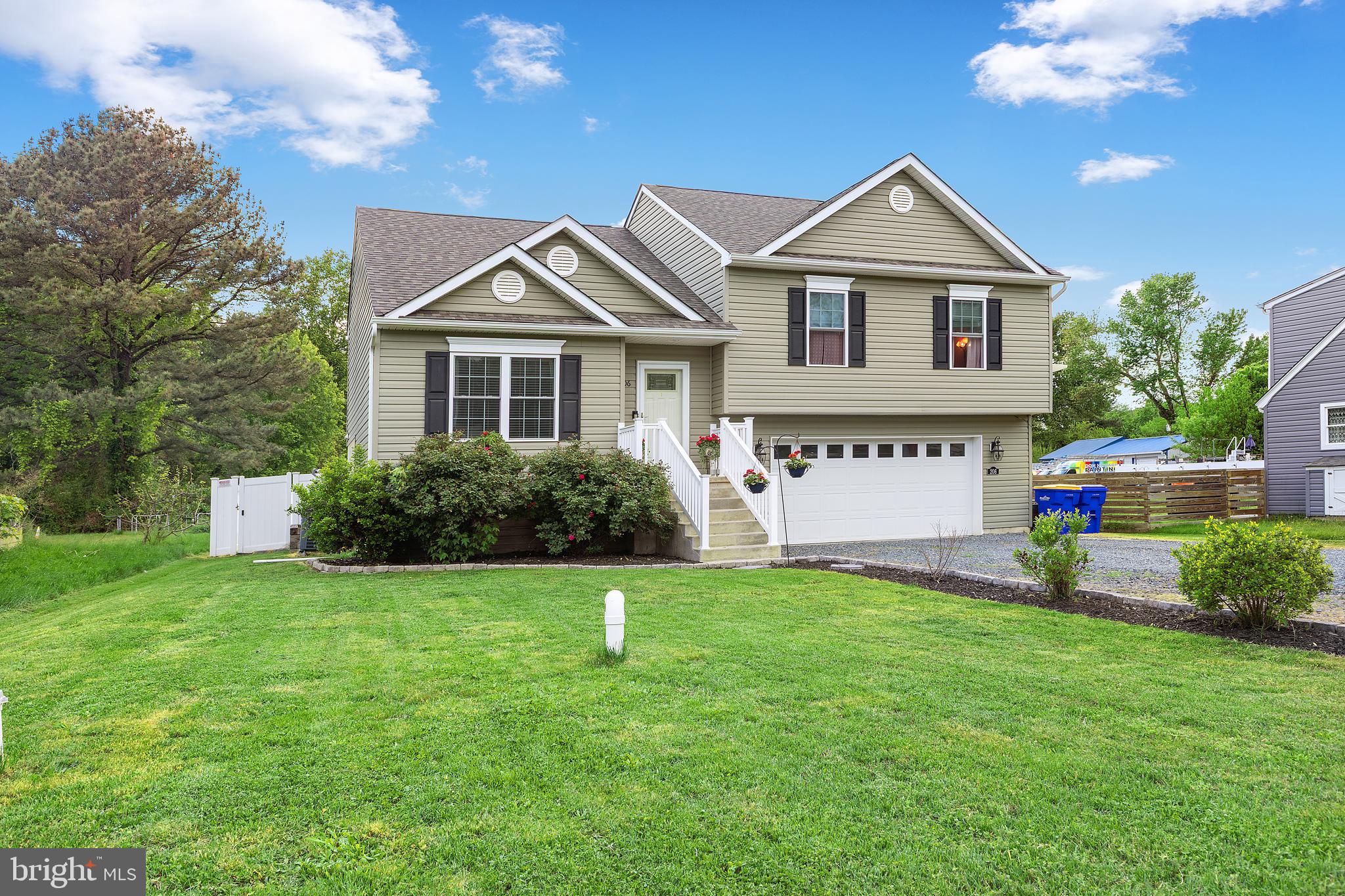 Welcome home to this beautifully maintained and fully updated 3-bedroom home, just 8 years young! Featuring like-new systems and roof, this home offers modern comfort and peace of mind. A 4-foot bump-out provides additional living space, while the upgraded kitchen boasts stainless steel appliances and sliding glass doors leading to a spacious 12x20 composite deck—perfect for entertaining.

Enjoy outdoor living with an above-ground pool, fully fenced backyard with white vinyl privacy fencing, and a crushed stone patio that leads to a cozy fire pit area. The long gravel driveway and oversized two-car garage offer ample parking and storage. 

Inside, you’ll find a spacious primary bedroom with a private full bath, plus an additional family room on the lower level with a convenient half bath—ideal for extra living space, guests, or a home office.

Perfectly maintained from the front door throughout, this hidden gem is conveniently located near Route 50, making it an excellent choice for commuters. No HOA!