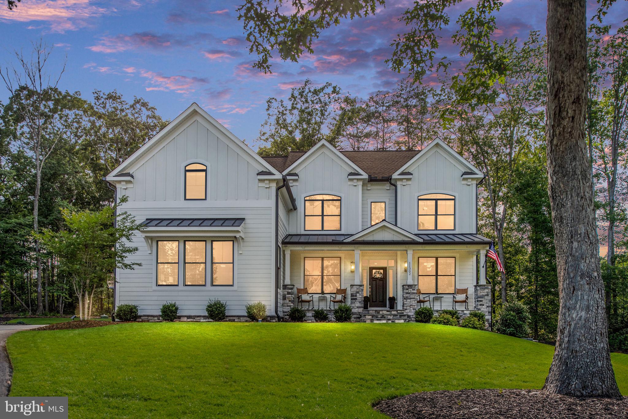 A Home That Truly Has It All

Welcome to this exceptional residence built by award-winning luxury builder Simply Home, located in the highly sought-after gated community of Fawn Lake. Offering a refined blend of elegance, comfort, and thoughtful design, this home provides access to premier amenities including a private lake with beach access, an Arnold Palmer-designed golf course, clubhouse, marina, tennis and pickleball courts, fitness center, swimming pool, walking trails, and 24/7 security—delivering a true resort-style lifestyle.

Just 3 years young, this meticulously maintained home presents like new construction, showcasing timeless architecture, high-end finishes, and a well-designed floor plan suited for both everyday living and entertaining.

The main level features a welcoming, light-filled foyer that opens to a formal dining room, perfect for hosting gatherings, along with a versatile space ideal for a home office or playroom. The spacious Great Room is the centerpiece of the home, complete with a custom fireplace, built-in cabinetry, and expansive Pella windows that fill the space with natural light.

The gourmet kitchen is both functional and beautifully appointed, offering white cabinetry, quartz countertops, an oversized center island, premium stainless steel appliances, a custom tile backsplash, and designer lighting. Wide-plank hardwood flooring flows throughout the main level, enhancing the home’s cohesive and upscale feel.

Upstairs, you will find four generously sized bedrooms, each with its own private en-suite bathroom, providing comfort and privacy for all. A bright loft area adds additional flexible living space. The luxurious Owner’s Suite features a tray ceiling and a spa-inspired bath with dual vanities, a soaking tub, and a large walk-in shower.

The walkout lower level is already framed and offers the opportunity to complete additional living space, including a future bedroom, full bathroom, and recreation area—ideal for a home theater, gym, or guest suite.

With its exceptional craftsmanship, modern finishes, oversized windows, and highly desirable community setting, this home presents a rare opportunity to enjoy luxury living in one of the region’s most prestigious gated communities.