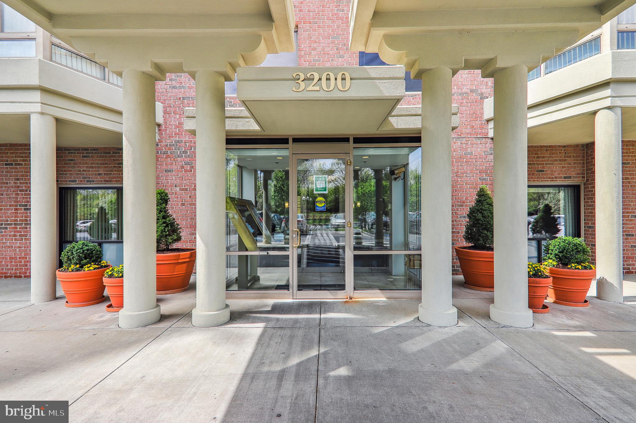 Welcome to this lovely 2-bedroom, 2-bathroom condo in Vantage Point East at Leisure World, one of Montgomery County’s premier 55+ active adult communities. This spacious 1,260 sq ft residence offers comfortable one-level living in a secure elevator building, with an open living and dining area, a kitchen that overlooks the main living space, in-unit washer and dryer, generous storage, and two bedrooms positioned on opposite sides of the home for added privacy. Both bedrooms offer direct access to the relaxing sunroom, creating a bright and flexible space for reading, hobbies, morning coffee, or simply enjoying the view. A dedicated storage unit and convenient parking add everyday ease. Life at Leisure World is designed for connection, convenience, and low-maintenance living, with 24-hour gated security, transportation service, walking paths, clubhouses, indoor and outdoor pools, fitness facilities, tennis and pickleball courts, an 18-hole championship golf course, restaurants, a pub, a library, art studio, woodworking shop, auditorium, ballroom, resident clubs, and an on-site MedStar Health Medical Center within the community. Vantage Point East is also just steps from Clubhouse II, placing many of Leisure World’s most popular amenities close to home.