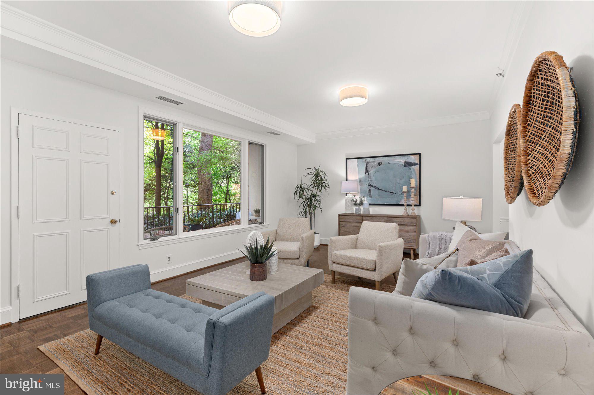 PRICE IMPROVEMENT!! Welcome to this meticulously updated 3 BR, 2 BA condo offering the spaciousness of a single-family home coupled with the conveniences of refined condo living in CHEVY CHASE! 2 Prime Garage Parking Spaces just a few steps from your front door. Greeting you with hardwood floors, soaring ceilings, a versatile floor plan, and abundant storage, this residence is a canvas for delightful living.
Upon entry, a grand foyer elegantly separates the living quarters from the bedroom areas. The expansive living room, heart of the home, features a massive picture window into nature & provides direct access to a wide private patio perfect for outdoor living relaxation! The living area features French-door access to a bedroom which could be a guest room, office space, home gym or extra sitting room for entertaining with dual access points.  Adjacent to the living room, discover a dedicated and intimate dining area poised for memorable gatherings and every day enjoyment.  This space flows seamlessly into the newly updated kitchen with freshly painted cabinets, hardware, and updated countertops. Tons of storage space and an open layout makes this kitchen both functional and practical.
Venturing to the sleeping wing of the home and you'll find the primary bedroom which invites relaxation with a sizable walk-in closet and serene views of the forest outside your window.  An en-suite bathroom, boasting a 4-piece suite and a chic, European-style vanity offers a wonderful space to get ready! The sizeable third bedroom also offers a walk-in closet, more nature views & room for guests or hobbies! The additional bathroom, featuring a tiled shower, is conveniently positioned to serve the secondary bedrooms.
Adding to the home’s allure are two assigned parking spaces located on the same level as the unit, 24-hour concierge service, manicured grounds, and a tranquil walking path with benches and water features within the community. PRIME LOCATION! Situated minutes away from the new Chevy Chase Lake development with Ritz Carlton, Amazon Fresh, CVS, restaurants, shopping and more. Down the street from 
vibrant Bethesda, a myriad of shopping and dining options await, including Bethesda Bagels for your morning pick-me-up, Woodmont Grill for fine dining, Salt Line, Anthropologie, Silver & More. 
COMMUTER’S DREAM! DC is just minutes away and the Beltway just up the street, a bus stop at the community entrance, and the new PURPLE line is close by making transportation is a breeze.
At 8101 Connecticut Avenue, Unit #N-106, every detail is curated for a lifestyle of convenience and luxury. Welcome to a home you will cherish! Welcome Home!