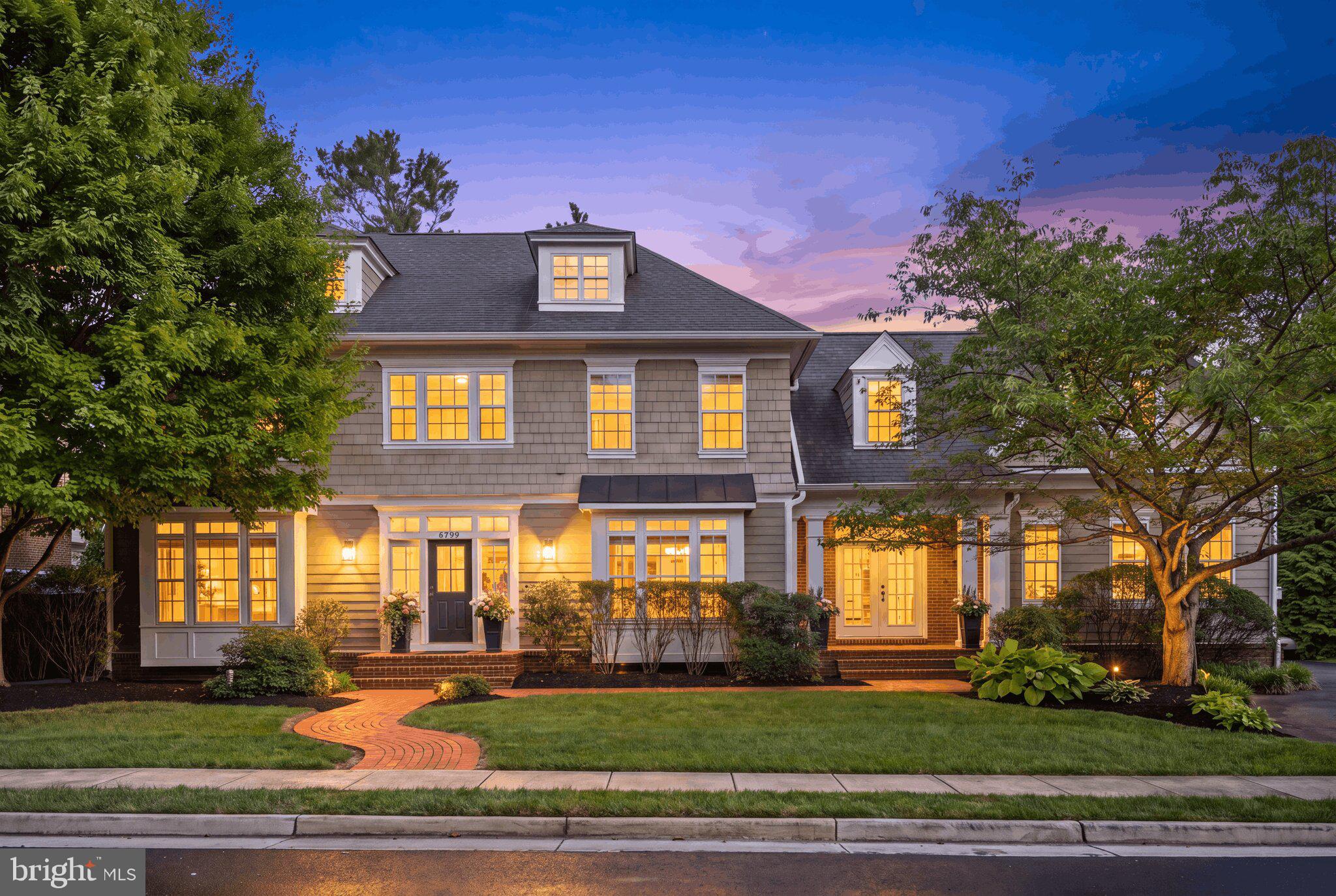 Welcome to 6799 Colby Crossing Way, a beautifully crafted Craftsman residence nestled in the prestigious Stoddard Woods community of Falls Church. Offering nearly 5,100 sqft of thoughtfully designed living space, this exceptional 5-bedroom, 5.5-bath home combines timeless elegance, quality craftsmanship, and an unbeatable location in one of Northern Virginia's most desirable neighborhoods.

From the moment you arrive, the home's stately curb appeal, manicured landscaping, welcoming front porch, and side-entry three-car garage make a lasting first impression. Inside, you'll discover sun-filled interiors accented by gleaming hardwood floors, extensive crown molding, custom built-ins, soaring ceilings, and refined architectural details throughout. Designed with both everyday living and elegant entertaining in mind, the flowing floor plan offers formal living and dining rooms, a spacious family room centered around a beautiful gas fireplace, and a gourmet kitchen featuring a large center island, premium appliances, abundant cabinetry, pantry, and a bright breakfast area where family and friends naturally gather.

The luxurious primary suite provides a peaceful retreat with a spa-inspired bath and generous walk-in closets, while each additional bedroom offers its own private or adjoining full bath, ensuring exceptional comfort for family members and overnight guests. A main-level laundry room, abundant storage, recessed lighting, and quality finishes throughout reflect the thoughtful design and meticulous care this home has received.

Step outside to the expansive deck overlooking the beautifully landscaped backyard—an ideal setting for morning coffee, summer barbecues, outdoor dining, or simply relaxing after a long day. The beautifully maintained yard with an irrigation system creates an inviting outdoor space that's both beautiful and easy to maintain.

Beyond the home itself, the lifestyle is second to none. Located within the highly sought-after Haycock Elementary, Longfellow Middle, and McLean High School pyramid, this home is just minutes from Downtown Falls Church, Tysons Corner, the Mosaic District, Arlington, and Washington, DC.  Everyday errands are effortless with Trader Joe's, Harris Teeter, Giant Food, and Wegman's all nearby, while outdoor enthusiasts will appreciate Cherry Hill Park, Jefferson District Park, and the scenic beauty of Great Falls Park. Commuters will love the convenient access to I-66, I-495, Route 7, and the West Falls Church Metro.

Luxury, location, and lifestyle rarely come together this seamlessly. Whether you're hosting unforgettable gatherings, enjoying quiet evenings on the deck, or taking advantage of the outstanding dining, shopping, parks, and commuter access just minutes away, this home offers the perfect balance of sophistication and everyday convenience. Opportunities to own a home of this caliber in Stoddard Woods are few and far between. 6799 Colby Crossing Way is more than just a beautiful home—it's an exceptional value and a rare opportunity to own one of Falls Church's finest residences. Don't miss your chance to make it yours.

>>Open to the public Saturday 1-4pm & Sunday 2-4pm! <<