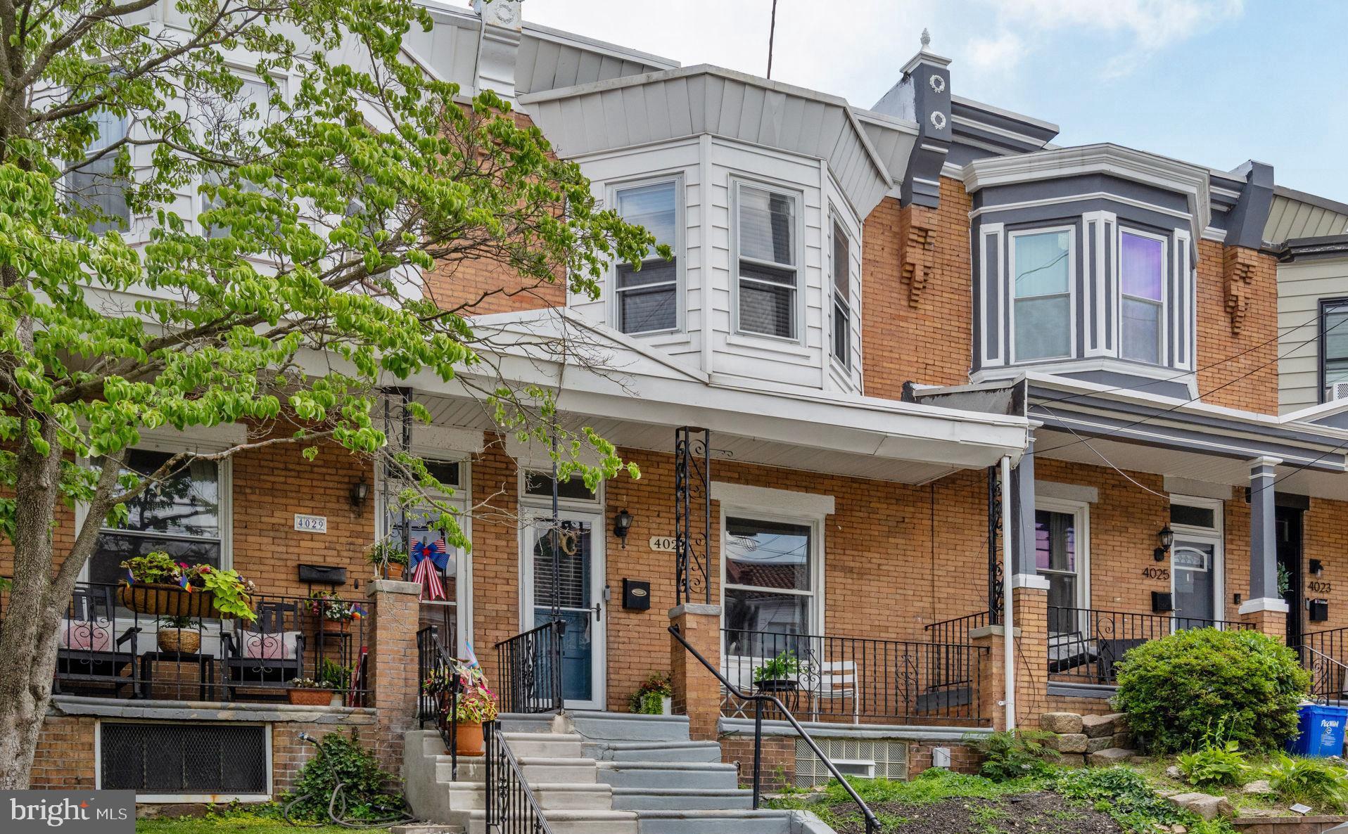 Welcome to 4027 Pechin St. a charming, sunny, Roxborough rowhouse where character meets everyday livability. The classic brick façade and traditional covered front porch set the tone before you even step inside.
Enter through the original carved wood door into a bright, welcoming living room adorned with wood columns, a mantle, and an oversized windows that floods the space with natural light. The seamless flow continues into a generous dining area with plenty of room for a proper dinner table, before landing in the kitchen, finished with wood cabinetry, granite countertops, and stainless-steel appliances. A standout feature of the first floor is a bright laundry room just off the kitchen, where exposed brick walls and a wall of windows give the back of the home a warmth most rowhouses simply don't have. Off of the kitchen, step outside to a private backyard, a quiet retreat perfect for, gardening, grilling, and entertaining.
Upstairs, three well-proportioned bedrooms including a primary bedroom wrapped in windows and large enough to accommodate a king bed with room to spare. A renovated full bath with tub/shower combination and linen closet completes the floor. Downstairs, the basement offers abundant storage.
Tucked between Ridge Ave and Main Street in the heart of Roxborough, you're steps from neighborhood staples like The Goat's Beard, Unity Java, and The Brass Tap, and just a short walk to Kendrick Park, Pretzel Park, and the Manayunk Canal Towpath, which connects you directly to the Schuylkill River Trail. The Manayunk Regional Rail station puts Center City just 17 minutes away without touching a car.
You won’t want to miss the Roxborough gem, schedule your tour today!