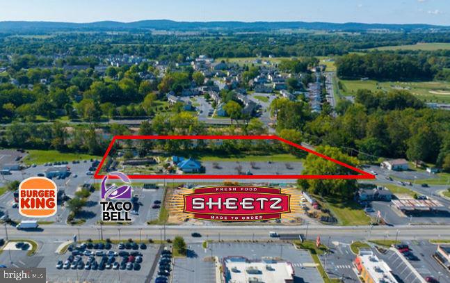 Excellent entertainment or redevelopment opportunity on ±4.94 acres in a high-visibility corridor just outside the City of Lebanon. The property enjoys visibility from Route 422, which carries over 15,000 vehicles per day. Located across from the Lebanon Valley Mall and surrounded by strong retailers including Sheetz, Starbucks, Planet Fitness, Hobby Lobby, and more. The property formerly operated as a mini golf course and includes a ±2,300 SF ice cream parlor and a ±384 SF arcade/storage building. Highway Commercial zoning and ample on-site parking make this site viable for a wide range of potential uses. Seller is a licensed Real Estate Broker in Florida.
