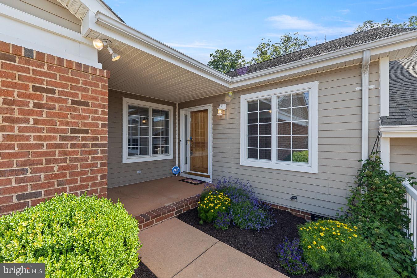 Welcome to sought-after Stony Pointe! This beautifully maintained one-level attached home offers the perfect blend of comfort, convenience, and quality updates. Featuring 2 bedrooms and 2 full baths, this home boasts hardwood flooring throughout most of the living areas, with lux plank flooring in the bathrooms. The kitchen has been tastefully updated with quartz countertops, refaced cabinetry that looks brand new, and upgraded appliances. The primary bath has been completely remodeled and also features quartz countertops.

Enjoy peaceful mountain views from the front and a private, tree-lined backdrop from the rear. Relax year-round in the enclosed patio/sunroom or entertain on the stamped concrete patio. Additional highlights include a two-car garage, and a stamped concrete driveway that adds to the home's curb appeal. Conveniently located in-town with easy access to shopping, dining, medical facilities, and  this move-in ready home offers easy living in one of the area's most desirable neighborhoods.