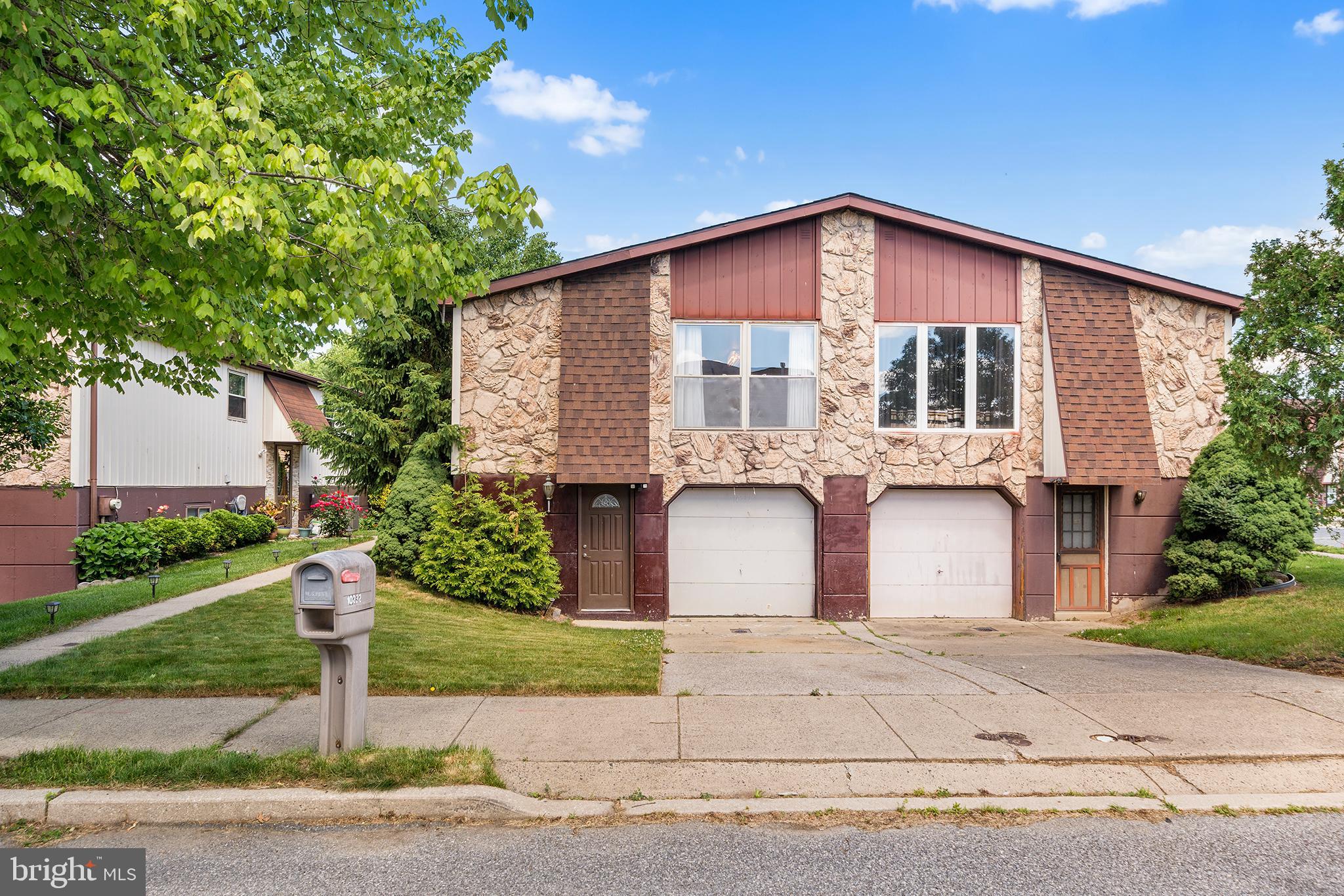 Welcome home to this beautiful 3-bedroom twin home, perfectly situated in a highly desirable Philadelphia location! The main living level is bathed in exceptional natural light, highlighting a spacious living room and a formal dining room that sits adjacent to the updated kitchen—fully equipped with stainless steel appliances and a gas range for the home chef. For ultimate convenience, the main level also hosts a generous Owner's Suite complete with a private ensuite bathroom and walk-in closet, alongside a bright secondary bedroom and a full hall bath. Downstairs, the versatile lower level offers a third bedroom or flexible bonus room with direct access to your rear patio and yard—perfect for outdoor entertaining—plus a handy half bath and seamless access to the garage. Mortgage savings may be available for buyers of this listing.
