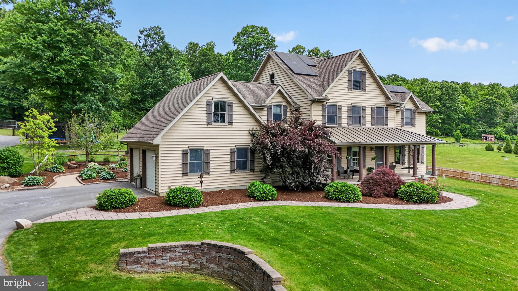 **This property will be offered at Public Auction on August 11, 2026 @ 6:00 PM. The listing price is the suggested opening bid only and in no way reflects the final sales price. $55,000 initial investment is due on auction date. 2% transfer tax to be paid by the purchaser. Settlement on or before October 9, 2026.
Discover the ultimate family country homestead nestled on 2 picturesque acres in the heart of the beautiful Welsh Mountains! This spacious 4-bedroom, 3-bath home offers comfortable living with thoughtful upgrades including a custom kitchen with island and walk-in pantry, family living room with fireplace, dedicated office/study, roomy basement with cold cellar, central heat & cooling, and an attached 2-car garage. Step outside to an entertainer’s paradise featuring an expansive front porch, incredible patio with built-in pizza fireplace, fire pit, propane grill, swimming pool area, productive gardens, children’s swing set, and privacy fencing. Additional highlights include an 18x24 horse barn with hay storage and pasture, 14x20 workshop, 10x14 garden shed, blacktop drive, 1,000-gal underground propane tank, and a deluxe PowerStream solar system with automated off-grid backup. Perfect for multi-generational living, hobby farming, or simply enjoying peaceful country life with modern conveniences. Don’t miss this rare opportunity at auction! 
IntelAuctions.com