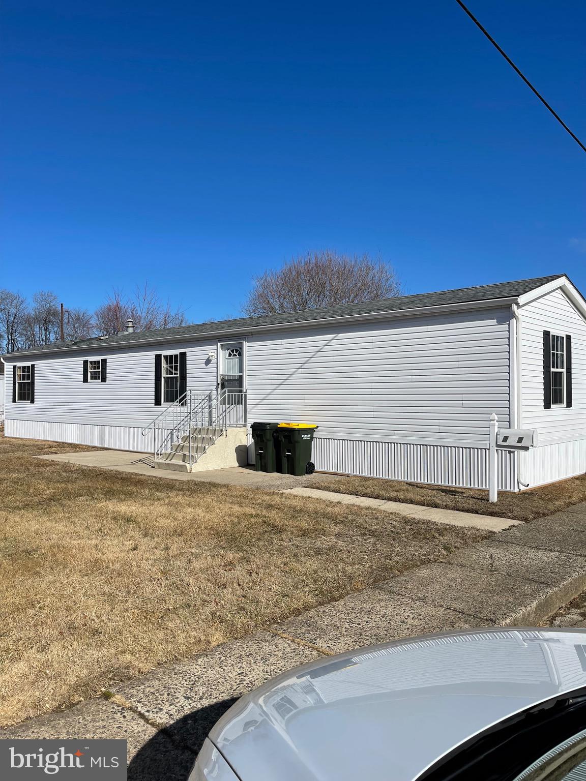 Large two bedroom, 2 full bathroom home. Central air. Front patio. Newer gutters, skirting, flooring, paint, appliances, kitchen counter and backsplash.