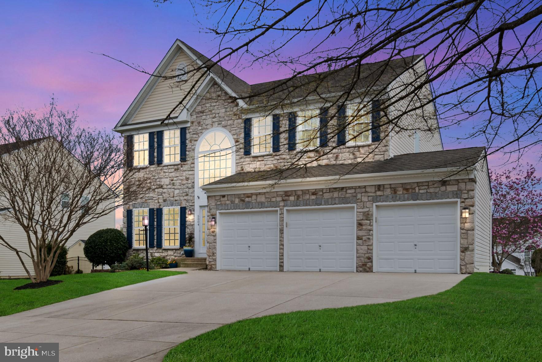 Multiple offers received. All best & final offers are due Friday at 11:59pm. WOW! Absolutely spectacular! Simply stated, this is one of the BEST homes, with the BEST features, in one of the BEST neighborhoods!! Boasting 5 bedrooms, 4 full baths and over 5000 total square feet, welcome home to 5004 Taylor Lane in Cider Mill, one of the most sought-after communities in Ellicott City. From the open floor plan to the fantastic outdoor living space, this gorgeous home hits the perfect balance of private living and every entertainer’s dream. Inside and out, you will find that every square inch of this home has been updated, loved and meticulously maintained. Stepping through the front door, you will find yourself in awe, immediately feeling the grandeur and quality that permeates throughout this home. The two-story foyer welcomes you with gleaming hardwood floors and modern chandeliers that cast a warm and inviting glow. Admire the stair rails, a stunning modern combination of wood and metal, leading up to the second level. A large radius window and dual transom windows bathes the space in natural light, enhancing the home's sophisticated ambiance. The kitchen is a chef’s dream presenting custom cabinetry, large island, granite counters, under cabinet lighting, high-end stainless-steel appliances, dual ovens, gas cooking and drawer microwave. The fabulous cabinet color, contrasted by the gold pulls and soft-white textured tile backsplash, makes this kitchen as delightful as any meal prepared within. It’s a culinary masterpiece in its own right, offering both functionality and a touch of luxury that elevates every cooking experience. As a nod to the open space concept in this home, the kitchen seamlessly transitions into a large family room. This inviting space is centered by a gas fireplace, offering warmth and ambiance, and is accentuated by a stunning two-story ceiling that enhances the room's grandeur and openness. This thoughtfully designed layout fosters connectivity and flow, perfect for both intimate family moments and larger gatherings. The amazing fully finished basement is a true highlight, featuring a custom bar setup that transforms it into a perfect social hub where friends love to visit. Off the kitchen is an expansive area dedicated to outdoor living, featuring a large maintenance-free deck and multiple paver patios. This well-appointed space is perfect for grilling, entertaining guests, or simply relaxing at the end of the day with your favorite drink by the fire. Whether hosting lively parties or enjoying a quiet evening under the stars, this outdoor oasis offers the ideal setting for all your leisure activities. This property is in an ideal location for shopping, restaurants, and commuting to both Baltimore and DC. Schedule your private tour today and envision your new beginning in this exceptional property.