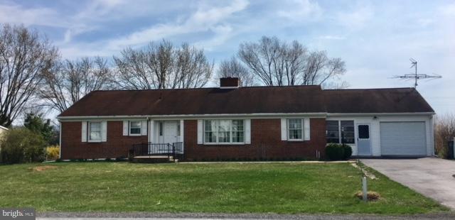 Great house on an amazing 1.3 acres.  This sturdy, move in ready house is waiting for you!  Wonderful living space with gorgeous oak flooring throughout- also under carpet.  Heat pump with oil backup.  Basement is full size of house with workshop and could be finished for more living space or extra bedroom!  This home is a must see.  Well still used for outside water source.