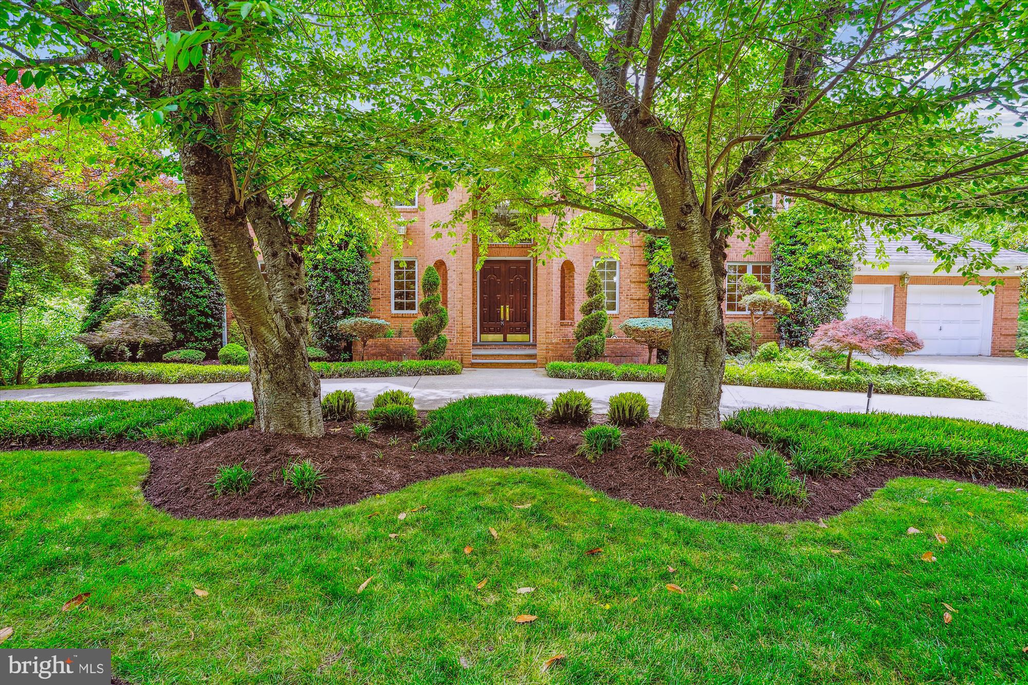 *Grand Entrance*: Stately mahogany doors open to a marble vestibule and a grand two-story foyer with a sweeping staircase—perfect for elegant entertaining. The home spans over 9,500 square feet of luxurious living space
*Custom Craftsmanship*: Extensive custom plasterwork and millwork feature crown moldings, raised panel wainscoting, cased openings, intricate ceiling medallions, and richly detailed baseboards. Solid core six-panel doors add a touch of sophistication at every turn.
*Inviting Fireplaces*: Four unique fireplaces, located in the Living Room, Family Room, Owner’s Suite, and Lower-Level Recreation Room, provide warmth and ambiance.
*Grand-Sized Dining Room*: Entertain in style in the spacious dining room, illuminated by a stunning chandelier.
*Sophisticated Study*: Achieve your best work in the main-level, fully paneled study with built-ins throughout.
*Charming Living Spaces*: The breakfast room, featuring a wall of windows overlooking a landscaped backyard, creates an inviting atmosphere.
*Gourmet Kitchen*: The heart of the home, this gourmet kitchen is equipped with granite countertops, a large center island, and top-of-the-line stainless steel appliances to meet all your entertaining needs.
*Luxurious Owner’s Suite*: Retreat to the opulent Owner’s Suite, which includes a cozy fireplace, oversized bathroom, spacious walk-in closet, and sauna.
The fully finished walk-out lower level boasts a full bar, wine closet, fifth bedroom, full bathroom, and powder room, as well as a fully equipped kitchen, billiards room, and a massive recreation area, totaling over 3,000 square feet of finished space.
Venture outside to a large deck overlooking the beautifully landscaped yard, perfect for relaxing or entertaining.
This home is truly a masterpiece waiting for you to call it your own!